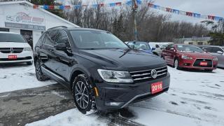 Smart Wheels - Your Trusted Used Car Dealership - Quality Cars, Exceptional Service!<br><br>2018 VOLKSWAGEN TIGUAN SEL 4MOTION<br>Body Type:  SUV<br>Engine:    2.0L TURBO I4 184HP 221FT. LBS.<br>Transmission:   8-SPEED AUTOMATIC<br>Doors:   4<br>Drive Type:   AWD<br><br>Key features: Navigation, Sunroof, Push start button, Keyless entry, 7-seater, Cruise control, Leather seats, Rear view camera and more.<br><br>Purchase price: $21,888 plus HST and LICENSING<br><br>Certification is available for only $799 which includes 3 month or 3ooo km Lubrico warranty with $1000 per claim.<br> If not certified, by OMVIC regulations this vehicle is being sold AS-lS and is not represented as being in road worthy condition, mechanically sound or maintained at any guaranteed level of quality. The vehicle may not be fit for use as a means of transportation and may require substantial repairs at the purchaser   s expense. It may not be possible to register the vehicle to be driven in its current condition.<br><br>CARFAX PROVIDED FOR EVERY VEHICLE<br><br>WARRANTY: Extended warranty with different terms and coverages is available, please ask our representative for more details.<br>FINANCING: Bad Credit? Good Credit? No Credit? We work with you to find the best financing plan that fits your budget. Our specialists are happy to assist you with all necessary information.<br>TRADE-IN OR SELL: Upgrade your ride by trading-in your vehicle and save on taxes, or Sell it to us, and get the best value for your current vehicle.<br><br>Smart Wheels Used Car Dealership<br>642 Dunlop St West, Barrie, ON L4N 9M5<br>Phone: (705)721-1341<br>Email: Info@swcarsales.ca<br>Web: www.swcarsales.ca<br>Terms and conditions may apply. Price and availability subject to change. Contact us for the latest information.<br>