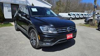 CLEAN CARFAX REPORT No Accidents, Low Mileage<br><br>2018 VOLKSWAGEN TIGUAN SEL 4MOTION AWD<br><br>Featuring Navigation, Sunroof, Push start button, Keyless entry, 7-seater, Cruise control, Leather seats, Rear view camera and more.<br><br>Purchase price: $21,888 plus HST and LICENSING<br><br>Safety package is available for $799 and includes Ontario Certification, 3 month or 3000 km Lubrico warranty ($1000 per claim) and oil change.<br>If not certified, by OMVIC regulations this vehicle is being sold AS-lS and is not represented as being in road worthy condition, mechanically sound or maintained at any guaranteed level of quality. The vehicle may not be fit for use as a means of transportation and may require substantial repairs at the purchaser s expense. It may not be possible to register the vehicle to be driven in its current condition.<br><br>CARFAX PROVIDED FOR EVERY VEHICLE<br><br>WARRANTY: Extended warranty with different terms and coverages is available, please ask our representative for more details.<br>FINANCING: Bad Credit? Good Credit? No Credit? We work with you to find the best financing plan that fits your budget. Our specialists are happy to assist you with all necessary information.<br>TRADE-IN OR SELL: Upgrade your ride by trading-in your vehicle and save on taxes, or Sell it to us, and get the best value for your current vehicle.<br><br>Smart Wheels Used Car Dealership<br>642 Dunlop St West, Barrie, ON L4N 9M5<br>Phone: (705)721-1341<br>Email: Info@swcarsales.ca<br>Web: www.swcarsales.ca<br>Terms and conditions may apply. Price and availability subject to change. Contact us for the latest information.<br>