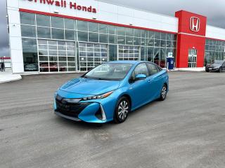 Odometer is 21895 kilometers below market average! Blue 2020 Toyota Prius Prime Upgrade FWD Continuously Variable (ECVT) 1.8L 4-Cylinder DOHC 16V. This one-owner Prius comes to us with very low milage and in excellent condition! Loaded with features including an aftermarket front and rear facing dashcam. Every pre-owned vehicle Cornwall Honda gets must go through a rigorous 100-point safety inspection performed by our Honda-trained technicians. 



At Cornwall Honda, we wouldnt let you leave our lot in a dirty vehicle, thats why our experienced, on-hand detailers are ready to take care of each vehicle sold. This is to ensure that your pre-owned vehicle looks as best as it possibly can. From steam cleaning all materials and fabrics to polishing any type of surface, we do it all!



Visit us at our dealership located at 2660 Brookdale Ave., Cornwall, ON.



Welcome to Cornwall Honda where we have been proudly serving the Cornwall and surrounding area since the early 1970s. Our team is committed to making this your best car-buying experience. One-stop shopping is a reality at Cornwall Honda. We have the vehicle that meets your needs. Located in beautiful Cornwall, just south of highway 401.



Cornwall Honda offers preferred bank rates and finance options for all walks-of-life in a professional, informative, and comfortable atmosphere. Our Finance team will work for you to get you approved for the vehicle you want.



CALL TODAY TO BOOK YOUR TEST DRIVE!!!!!



ABS brakes, Active Cruise Control, Alloy wheels, Electronic Stability Control, Heated door mirrors, Heated Front Bucket Seats, Heated front seats, Illuminated entry, Low tire pressure warning, Navigation System, Remote keyless entry, Traction control.



Full Vehicle History Report includes CarFax Report and any available Maintenance/Repair Records.
