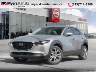 <b>Heated Seats,  Heated Steering Wheel,  Aluminum Wheels,  Remote Keyless Entry,  Low Speed Brake Assist!</b><br> <br>  Compare at $26813 - KANATA NISSAN PRICE is just $25295! <br> <br>   The versatile design of the 2021 Mazda CX-30 offers ease and agility without compromising on capability and space. This  2021 Mazda CX-30 is for sale today in Kanata. This  SUV has 88,534 kms. Its  silver in colour  . It has an automatic transmission and is powered by a  186HP 2.5L 4 Cylinder Engine. <br> <br> Our CX-30s trim level is GS. Ultimate comfort is the primary focus of this CX-30 GS with heated front seats and a heated steering wheel to keep you warm on those cold winter days. Additional features youre sure to appreciate are larger and more stylish aluminum wheels, a leather-wrapped steering wheel, shift knob and parking brake, a 8.8 inch colour touchscreen display with MAZDA CONNECT and 8 Harmonic Acoustics speakers, Apple CarPlay and Android Auto, plus Bluetooth streaming audio. This trim also includes auto high-beam LED headlamps, advanced blind spot detection, auto climate control, premium cloth seats, rear cross traffic alert, lane keeping assist and lane departure warning. This vehicle has been upgraded with the following features: Heated Seats,  Heated Steering Wheel,  Aluminum Wheels,  Remote Keyless Entry,  Low Speed Brake Assist,  Rearview Camera,  Steering Wheel Audio Control. <br> <br/><br> Payments from <b>$406.84</b> monthly with $0 down for 84 months @ 8.99% APR O.A.C. ( Plus applicable taxes -  and licensing    ).  See dealer for details. <br> <br>*LIFETIME ENGINE TRANSMISSION WARRANTY NOT AVAILABLE ON VEHICLES WITH KMS EXCEEDING 140,000KM, VEHICLES 8 YEARS & OLDER, OR HIGHLINE BRAND VEHICLE(eg. BMW, INFINITI. CADILLAC, LEXUS...)<br> Come by and check out our fleet of 50+ used cars and trucks and 90+ new cars and trucks for sale in Kanata.  o~o