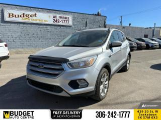 <b>Bluetooth,  Heated Seats,  Rear View Camera,  SiriusXM,  Aluminum Wheels!</b><br> <br>    With excellent fuel economy, plenty of engine power and lots of cargo area, this Ford Escape is designed to have your back no matter what the task. This  2018 Ford Escape is for sale today. <br> <br>Although there are many compact SUVs to choose from, few have the styling, performance, and features offered by this 5-passenger Ford Escape. Beyond its strong, efficient drivetrain and handsome styling, this Escape offers nimble handling and a comfortable ride. The interior boasts smart design and impressive features. If you need the versatility of an SUV but want something fuel-efficient and easy to drive, this Ford Escape is just right. This  SUV has 131,301 kms. Its  silver in colour  . It has a 6 speed automatic transmission and is powered by a  179HP 1.5L 4 Cylinder Engine.  <br> <br> Our Escapes trim level is SE. This Escape SE offers a satisfying blend of features and value. It comes with a SYNC infotainment system with Bluetooth connectivity, SiriusXM, a USB port, a rearview camera, heated front seats, steering wheel-mounted audio and cruise control, dual-zone automatic climate control, power windows, power doors, aluminum wheels, fog lamps, and more. This vehicle has been upgraded with the following features: Bluetooth,  Heated Seats,  Rear View Camera,  Siriusxm,  Aluminum Wheels,  Steering Wheel Audio Control. <br> To view the original window sticker for this vehicle view this <a href=http://www.windowsticker.forddirect.com/windowsticker.pdf?vin=1FMCU9GD3JUB64573 target=_blank>http://www.windowsticker.forddirect.com/windowsticker.pdf?vin=1FMCU9GD3JUB64573</a>. <br/><br> <br>To apply right now for financing use this link : <a href=https://www.budgetautocentre.com/used-cars-saskatoon-financing/ target=_blank>https://www.budgetautocentre.com/used-cars-saskatoon-financing/</a><br><br> <br/><br> Buy this vehicle now for the lowest bi-weekly payment of <b>$121.16</b> with $0 down for 84 months @ 5.99% APR O.A.C. ( Plus applicable taxes -  Plus applicable fees   ).  See dealer for details. <br> <br><br> Budget Auto Centre has been a trusted name in the Automotive industry for over 40 years. We have built our reputation on trust and quality service. With long standing relationships with our customers, you can trust us for advice and assistance on all your automotive needs. </br>

<br> With our Credit Repair program, and over 250+ well-priced used vehicles in stock, youll drive home happy. We are driven to ensure the best in customer satisfaction and look forward working with you. </br> o~o