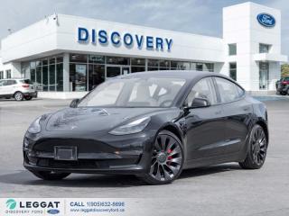 ACCIDENT-FREE, ONE OWNER, LOW KM\ Finished in a Solid Black exterior that complements the White vegan interior, standing on a set of 20-inch alloy wheels. Beneath the hood, you will reveal an electric engine paired with an automatic transmission layered with Teslas All-Wheel Drive system (AWD). Slide into the interior and be impressed to find features including navigation, backup camera, AM/FM/XM radio, Bluetooth, Apple CarPlay & Android Auto, heated front and rear seats, heated steering wheel, blind-spot monitor, panoramic moonroof, wireless phone charging pad and so much more. What are you waiting for? Come in and experience this 2021 Tesla Model 3 Performance AWD!