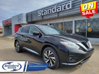 <b>Sunroof,  Navigation,  Leather Seats,  Cooled Seats,  Premium Sound Package!</b><br> <br>  Compare at $30299 - Our Price is just $28812! <br> <br>   This Nissan Murano is a smart choice if you want an upscale crossover without having to step up to a luxury brand. This  2018 Nissan Murano is for sale today in Swift Current. <br> <br>Enjoy a premium crafted crossover experience. This Nissan Murano leads with innovation and follows through with devotion to the smallest detail. An unmistakable exterior draws you in. The well-appointed interior creates a personal environment for the driver while keeping your passengers comfortable. A potent drivetrain delivers confident, refined control. Embrace the details. Delight in technology. It all starts with a touch of the push-button ignition. This  SUV has 93,742 kms. Its  magnetic black metallic in colour  . It has a cvt transmission and is powered by a  260HP 3.5L V6 Cylinder Engine.  It may have some remaining factory warranty, please check with dealer for details. <br> <br> Our Muranos trim level is AWD Platinum. This Murano Platinum is a portrait of luxury. It comes with a power panoramic moonroof, remote start, navigation, Bluetooth, a power liftgate, a heated, leather-wrapped steering wheel, leather seats which are heated and cooled in front, heated back seats, an around view monitor, Bose 11-speaker premium audio, blind spot warning, moving object detection, intelligent cruise control, forward emergency braking, and more. This vehicle has been upgraded with the following features: Sunroof,  Navigation,  Leather Seats,  Cooled Seats,  Premium Sound Package,  Bluetooth,  Heated Seats. <br> <br>To apply right now for financing use this link : <a href=https://www.standardnissan.ca/finance/apply-for-financing/ target=_blank>https://www.standardnissan.ca/finance/apply-for-financing/</a><br><br> <br/><br>Why buy from Standard Nissan in Swift Current, SK? Our dealership is owned & operated by a local family that has been serving the automotive needs of local clients for over 110 years! We rely on a reputation of fair deals with good service and top products. With your support, we are able to give back to the community. <br><br>Every retail vehicle new or used purchased from us receives our 5-star package:<br><ul><li>*Platinum Tire & Rim Road Hazzard Coverage</li><li>**Platinum Security Theft Prevention & Insurance</li><li>***Key Fob & Remote Replacement</li><li>****$20 Oil Change Discount For As Long As You Own Your Car</li><li>*****Nitrogen Filled Tires</li></ul><br>Buyers from all over have also discovered our customer service and deals as we deliver all over the prairies & beyond!#BetterTogether<br> Come by and check out our fleet of 40+ used cars and trucks and 40+ new cars and trucks for sale in Swift Current.  o~o