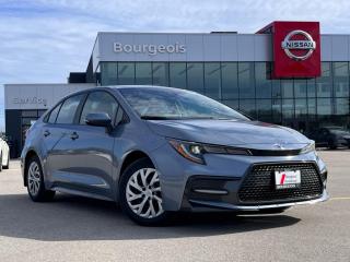 <b>Sport Suspension,  Aluminum Wheels,  Heated Seats,  Blind Spot Detection,  Lane Keep Assist!</b><br> <br>    This Toyota Corolla is hard to pass up with its modern design and advanced safety features. This  2021 Toyota Corolla is fresh on our lot in Midland. <br> <br>Loaded with premium safety features, this Toyota Corolla also offers assertive style and performance that thrills. Thanks to its powerful yet efficient engine, this amazing compact sedan yeilds incredible fuel economy in a fun to drive package. With seating for five and a folding rear seat, it comes with plenty of extra space for family, friends or extra cargo when needed. Built with the quality and reliability you expect, this Corolla brings an iconic name into the future with ease.This  sedan has 60,335 kms. Its  gray in colour  . It has a cvt transmission and is powered by a  169HP 2.0L 4 Cylinder Engine.  This unit has some remaining factory warranty for added peace of mind. <br> <br> Our Corollas trim level is SE. For a more engaging driving experience, this Corolla SE has been upgraded with a sport suspension, dual tip exhaust, stylish aluminum wheels, exclusive and more aggressive bumpers, a sport mode button that allows for faster engine response, smart proximity keys with push button start and heated sport seats. This awesome Toyota Corolla also includes automatic climate control, sleek Bi-LED headlights, a larger 8 inch touchscreen display featuring Apple CarPlay and Android Auto, advanced voice recognition, 6 speakers, next gen USB 2.0 audio ports, wireless streaming audio, SIRI Eyes Free and a crisp rear view camera. Additional features include blind spot detection, remote keyless entry, Toyota Safety Sense, dynamic radar cruise control, lane departure warning with lane steering assist, power windows, power adjustable heated mirrors and much more. This vehicle has been upgraded with the following features: Sport Suspension,  Aluminum Wheels,  Heated Seats,  Blind Spot Detection,  Lane Keep Assist,  Led Lights,  Apple Carplay. <br> <br>To apply right now for financing use this link : <a href=https://www.bourgeoisnissan.com/finance/ target=_blank>https://www.bourgeoisnissan.com/finance/</a><br><br> <br/><br>Since Bourgeois Midland Nissan opened its doors, we have been consistently striving to provide the BEST quality new and used vehicles to the Midland area. We have a passion for serving our community, and providing the best automotive services around.Customer service is our number one priority, and this commitment to quality extends to every department. That means that your experience with Bourgeois Midland Nissan will exceed your expectations whether youre meeting with our sales team to buy a new car or truck, or youre bringing your vehicle in for a repair or checkup.Building lasting relationships is what were all about. We want every customer to feel confident with his or her purchase, and to have a stress-free experience. Our friendly team will happily give you a test drive of any of our vehicles, or answer any questions you have with NO sales pressure.We look forward to welcoming you to our dealership located at 760 Prospect Blvd in Midland, and helping you meet all of your auto needs!<br> Come by and check out our fleet of 30+ used cars and trucks and 90+ new cars and trucks for sale in Midland.  o~o