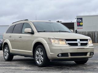 White Gold Clearcoat 2010 Dodge Journey SXT 4D Sport Utility 3.5L V6 MPI 24V High-Output 6-Speed Automatic FWD 3.5L V6 MPI 24V High-Output, 3.43 Axle Ratio, Air Conditioning, AM/FM radio, CD player, Delay-off headlights, Driver door bin, Driver vanity mirror, Front Bucket Seats, Front reading lights, Fully automatic headlights, Passenger door bin, Passenger vanity mirror, Power driver seat, Power steering, Power windows, Premium Cloth Low-Back Bucket Seats, Rear window defroster, Remote keyless entry, Steering wheel mounted audio controls, Trip computer, Variably intermittent wipers.