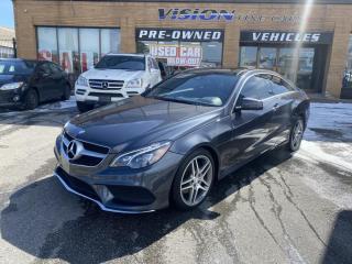2014 Mercedes Benz E350 Coupe 4Matic, a Great German Luxury Coupe !<br><br>GREAT CONDITION, this 2014 Mercedes Benz E350 comes with a 3.5 LITRE 6 CYLINDER MOTOR that puts out 302 HORSEPOWER.<br><br>Interior includes: LEATHER HEATED SEATS, SUNROOF, and a GREAT SOUNDING HARMON KARDON STEREO SYSTEM.<br><br> The 2014 Mercedes-Benz E-Class epitomizes the modern midsize luxury car with its elegant furnishings, exacting workmanship and huge selection of engines and features. If youre shopping in this class, its not to be missed,  (edumunds.com).<br><br>Driving aids include: 4MATIC ALL WHEEL DRIVE and PROXIMITY SENSORS !<br><br>Comes complete with power locks, power windows, and keyless remote entry.<br><br>This car has safety included in the advertised price.<br><br>Please Note: HST and Licensing is an additional fee separate from the advertised price. <br><br>We have a strong confidence in our cars, if you want to have a car inspected, Vision Fine Cars welcomes it.<br>  <br>Certain Crypto-Currency accepted as payment, Charges will apply.<br>