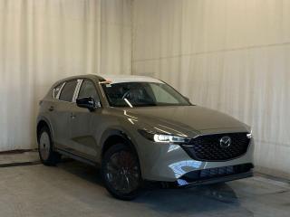<p>NEW 2024 CX-5 Suna Edition AWD. Bluetooth, Skyactiv-G 2.5 L (Inline-4) Dynamic Pressure Turbo. Backup Cam, NAV, Teracotta Leather Heated/Ventilated Seats, Power Front Seats, Memory Driver Seat, Rear Heated Seats, Wireless Apple CarPlay/Android Auto, Wireless Phone Charger, Bose Premium Sound System, Advanced Keyless Remote Entry, Tilt/Sliding Moonroof, Power Trunk, Adaptive Cruise Control, Heated Steering Wheel, Wiper Blade De-Icer, Auto Dual-Zone Climate Control, Rear Air Vents, Auto Rain-Sensing Wipers, Electronic Parking Brake, Heated Mirrors, 19 Black Metallic Alloy Wheels</p>  <p>Includes:</p> <p>i-ACTIVSENSE + Safety Features (Smart City Brake Support-Front, Rear Cross Traffic Alert, Mazda Radar Cruise Control With Stop & Go, Distance Recognition Support System, Lane-Keep Assist System, Lane Departure Warning System, Advanced Blind Spot Monitoring)</p>  <p>A joy to drive, our 2024 Mazda CX-5 Suna Edition AWD radiates refined style in Zircon Sand Metallic! Motivated by a 2.5 Liter 4 Cylinder that delivers 256hp tethered to a paddle-shifted 6 Speed Automatic transmission. You can put that strength to good use with the added traction of torque vectoring, and this All Wheel Drive SUV returns nearly approximately 7.8L/100km on the highway. Our CX-5 also has an expressive design with bold details like 19-inch alloy wheels, a rear roof spoiler, and bright-tipped dual exhaust outlets.</p>  <p>Our Suna Edition cabin is no ordinary interior. Its tailor-made for better travel with heated leather power front seats, a leather-wrapped steering wheel, automatic climate control, pushbutton ignition, and keyless access. Mazda makes connecting easy by providing a 10.25-inch central display, a multifunction Commander controller, Apple CarPlay/Android Auto, Bluetooth, voice control, and six-speaker audio. The versatile rear cargo space adds adventure-friendly functionality.</p>  <p>Safety is a high priority for Mazda, which helps protect you and your loved ones with automatic emergency braking, adaptive cruise control, a rearview camera, lane-keeping assistance, blind-spot monitoring, and other intelligent technologies. With all that, our CX-5 Suna Edition is here to transcend the ordinary! Save this page, Come in for a Qualified Test Drive. We Know You Will Enjoy Your Test Drive Towards Ownership!</p>  <p>Call 587-409-5859 for more info or to schedule an appointment! Listed Pricing is valid for 72 hours. Financing is available, please see dealer for term availability and interest rates. AMVIC Licensed Business.</p>