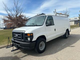 <div>2013 Ford E 250 cargo 5.4L automatic, air conditioning, ladder racks.  Composite 1/2 inch rubber floor. Shelving. Power inverter, excellent running condition.  Very tidy. sold as is. plus HST </div>