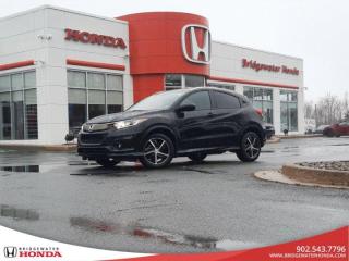 Recent Arrival! Nh731p 2021 Honda HR-V Sport AWD CVT 1.8L I4 SOHC 16V i-VTEC Bridgewater Honda, Located in Bridgewater Nova Scotia.HR-V Sport, CVT, AWD, 4-Wheel Disc Brakes, 6 Speakers, ABS brakes, Air Conditioning, Apple CarPlay/Android Auto, Auto High-beam Headlights, Backup Camera, Brake assist, Bumpers: body-colour, Cruise Control, Delay-off headlights, Driver door bin, Driver vanity mirror, Dual front impact airbags, Dual front side impact airbags, Electronic Stability Control, Emergency communication system: HondaLink Assist, Forward collision: Collision Mitigation Braking System (CMBS) + FCW mitigation, Front anti-roll bar, Front Bucket Seats, Front dual zone A/C, Front fog lights, Front reading lights, Front wheel independent suspension, Fully automatic headlights, Heated door mirrors, Heated Front Bucket Seats, Heated front seats, Illuminated entry, Lane departure: Lane Keeping Assist System (LKAS) active, Low tire pressure warning, Occupant sensing airbag, Outside temperature display, Overhead airbag, Panic alarm, Passenger door bin, Passenger vanity mirror, Power door mirrors, Power moonroof, Power steering, Power windows, Radio: 180-Watt AM/FM Audio System, Rear anti-roll bar, Rear window defroster, Rear window wiper, Remote keyless entry, Roof rack: rails only, Security system, Speed-sensing steering, Split folding rear seat, Spoiler, Sport Fabric Seating Surfaces, Steering wheel mounted audio controls, Tachometer, Telescoping steering wheel, Tilt steering wheel, Traction control, Trip computer, Turn signal indicator mirrors, Variably intermittent wipers, Wheels: 17 2-Tone Black Aluminum Alloy.