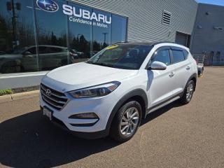 New Price!Winter White 2018 Hyundai Tucson SE AWD 6-Speed Automatic with Overdrive 2.0L I4 DGI DOHC 16V ULEV II 164hpValue Market Pricing, AWD, 6 Speakers, ABS brakes, Air Conditioning, Alloy wheels, Exterior Parking Camera Rear, Front fog lights, Fully automatic headlights, Heated door mirrors, Heated front seats, Heated rear seats, Heated steering wheel, Leather Seat Trim, Power driver seat, Power moonroof, Steering wheel mounted audio controls, Variably intermittent wipers.Certification Program Details: MVI Only Fresh Oil ChangeFair Market Pricing * No Pressure Sales Environment * Access to over 2000 used vehicles * Free Carfax with every car * Our highly skilled and experienced team will ensure that your vehicle is in excellent condition and looking fantastic!!Awards:* JD Power Canada Initial Quality Study (IQS)Steele Auto Group is the most diversified group of automobile dealerships in Atlantic Canada, with 34 dealerships selling 27 brands and an employee base of over 1000. Sales are up by double digits over last year and the plan going forward is to expand further into Atlantic Canada.Reviews:* Most owners say this era of Tucson attracted their attention with unique exterior styling, and sealed the deal with a great balance of comfortable ride quality and sporty, spirited driving dynamics. Bang-for-the-buck was highly rated as well. Source: autoTRADER.ca