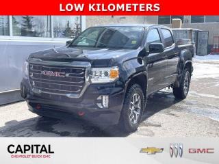 Look at this 2022 GMC Canyon 4WD AT4 w/Leather. A PERFETC LITTLE TRUCK FOR ALL YOUR BASIC NEEDS WITH CLEAN CARFAX & SINGLE OWNER, Comes With KEYLESS ENTRY, APPLE CARPLAY ANDROID AUTO, 4 WAY POWER ADJUSTABLE SEATS, BACKUP CAMERA, AUTO 4X4, TRAILER BRAKE CONTROL & REMOTE START.Its Automatic transmission and Gas V6 3.6L/222 engine will keep you going. This GMC Canyon has the following options: ENGINE, 3.6L DI DOHC V6 VVT (308 hp [230.0 kW] @ 6800 rpm, 275 lb-ft of torque [373 N-m] @ 4000 rpm) (STD), Windows, power with driver Express-Up and Down, Window, rear-sliding, manual, Wi-Fi Hotspot capable (Terms and limitations apply. See onstar.ca or dealer for details.), Wheels, 17 x 8 (43.2 cm x 20.3 cm) Dark Argent Metallic cast aluminum, Visors, driver and front passenger illuminated sliding vanity mirrors, USB data ports, 2 includes auxiliary input jack, located on the front console (Not available with (IOU) 8 diagonal GMC Infotainment System with Navigation.), USB charging-only ports, 2, located on the rear of the centre console, Transfer case, electric, 2-speed Autotrac, and Transfer case shield. See it for yourself at Capital Chevrolet Buick GMC Inc., 13103 Lake Fraser Drive SE, Calgary, AB T2J 3H5.