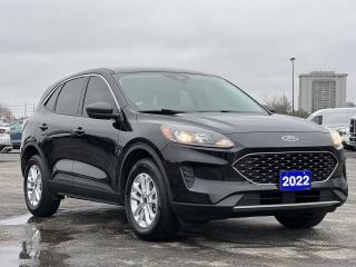 Black 2022 Ford Escape SE 200A 200A 4D Sport Utility 1.5L EcoBoost 8-Speed Automatic AWD AWD, 3.81 Axle Ratio, Adaptive Cruise Control (ACC) w/Stop & Go, Air Conditioning, Alloy wheels, AM/FM radio: SiriusXM, Auto High-beam Headlights, Block heater, Cold Weather Package, Delay-off headlights, Driver door bin, Driver vanity mirror, Electronic Automatic Temperature Control, Evasive Steering Assist, Ford Co-Pilot360 Assist+, Fully automatic headlights, Heated Premium-Wrapped Steering Wheel, Heated Sideview Mirrors, Passenger door bin, Power steering, Power windows, Rear window defroster, Remote keyless entry, Remote Start System w/86C, Speed Sign Recognition, Speed-Sensitive Wipers, Variably intermittent wipers, Voice-Activated Touchscreen Navigation System.