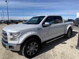 <p>2016 F-150 Lariat with 135,836 kms.  Includes fender flares, mud flaps, spray in bed liner, and a hard folding tonneau cover! Twin panel moonroof, blind spot system, CD player, adaptive cruise control, lariat chrome appearance package and more!  Call of come see us for a test drive!</p>