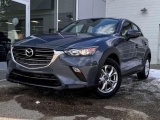Our great looking 2021 Mazda CX-3 GS is shown off in Polymetal Grey Metallic! Its powered by a 2.0 Liter 4 Cylinder engine that produces 146 horsepower while paired with a 6-Speed Automatic transmission. Its absolutely stunning with alloy wheels, rear roof spoiler and dual exhaust.Inside our GS, open the door tofind a world of comfort and convenience with leather trimmed cloth seating, front heated seats, a leather-wrapped heated steering wheel with mounted audio/cruise controls, and a power sunroof. Its also equipped with an AM/FM radio thats XM radio ready,USB/AUX inputs for mobile devices, Bluetooth hands-free phone system,a multi-function commander control andan impressive 6 speaker sound system.Our Mazda will give you peace of mind with its wide variety of safety features including a back-up camera, dusk sensing headlights, stability/traction control, an immense amount of airbags and more!Print this page and call us Now... We Know You Will Enjoy Your Test Drive Towards Ownership! We look forward to showing you why Go Mazda is the best place for all your automotive needs.Go Mazda is an AMVIC licensed business.Please note: this vehicle was previously used as a Rental.