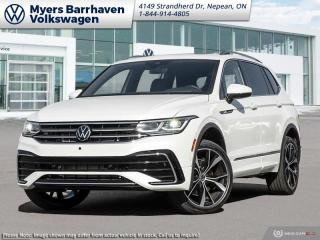 <b>Premium Audio,  Cooled Seats,  Navigation,  360 Camera,  Sunroof!</b><br> <br> <br> <br>  Everything from capacity, capability, comfort, and ease of use was designed with relentless purpose on this 2023 Tiguan. <br> <br>Whether its a weekend warrior or the daily driver this time, this 2024 Tiguan makes every experience easier to manage. Cutting edge tech, both inside the cabin and under the hood, allow for safe, comfy, and connected rides that keep the whole party going. The crossover of the future is already here, and its called the Tiguan.<br> <br> This oryx white pearl effect SUV  has an automatic transmission and is powered by a  2.0L I4 16V GDI DOHC Turbo engine.<br> <br> Our Tiguans trim level is Highline R-Line. This range-topping Tiguan Highline R-Line is fully-loaded with ventilated and heated leather-wrapped seats with power adjustment, lumbar support and memory function, a heated leather-wrapped steering wheel, an 8-speaker Fender audio system with a subwoofer, adaptive cruise control, a 360-camera with aerial view, park distance control with automated parking sensors, and remote engine start. Additional features include an express open/close sunroof with tilt and slide functions and a power sunshade, rain detecting wipers with heated jets, a power liftgate, 4G LTE mobile hotspot internet access, and an 8-inch infotainment screen with satellite navigation, wireless Apple CarPlay and Android Auto, and SiriusXM streaming radio. Safety features also include blind spot detection, lane keep assist, lane departure warning, VW Car-Net Safe & Secure, forward and rear collision mitigation, and autonomous emergency braking. This vehicle has been upgraded with the following features: Premium Audio,  Cooled Seats,  Navigation,  360 Camera,  Sunroof,  Power Liftgate,  Wireless Charging. <br><br> <br>To apply right now for financing use this link : <a href=https://www.barrhavenvw.ca/en/form/new/financing-request-step-1/44 target=_blank>https://www.barrhavenvw.ca/en/form/new/financing-request-step-1/44</a><br><br> <br/>    4.99% financing for 84 months. <br> Buy this vehicle now for the lowest bi-weekly payment of <b>$329.57</b> with $0 down for 84 months @ 4.99% APR O.A.C. ( Plus applicable taxes -  $840 Documentation fee. Cash purchase selling price includes: Tire Stewardship ($20.00), OMVIC Fee ($12.50). (HST) are extra. </br>(HST), licence, insurance & registration not included </br>    ).  Incentives expire 2024-05-31.  See dealer for details. <br> <br> <br>LEASING:<br><br>Estimated Lease Payment: $278 bi-weekly <br>Payment based on 3.99% lease financing for 48 months with $0 down payment on approved credit. Total obligation $28,995. Mileage allowance of 16,000 KM/year. Offer expires 2024-05-31.<br><br><br>We are your premier Volkswagen dealership in the region. If youre looking for a new Volkswagen or a car, check out Barrhaven Volkswagens new, pre-owned, and certified pre-owned Volkswagen inventories. We have the complete lineup of new Volkswagen vehicles in stock like the GTI, Golf R, Jetta, Tiguan, Atlas Cross Sport, Volkswagen ID.4 electric vehicle, and Atlas. If you cant find the Volkswagen model youre looking for in the colour that you want, feel free to contact us and well be happy to find it for you. If youre in the market for pre-owned cars, make sure you check out our inventory. If you see a car that you like, contact 844-914-4805 to schedule a test drive.<br> Come by and check out our fleet of 30+ used cars and trucks and 90+ new cars and trucks for sale in Nepean.  o~o