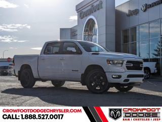 <b>Low Mileage, Navigation,  Heated Seats,  4G Wi-Fi,  Heated Steering Wheel,  Forward Collision Alert!</b><br> <br> Welcome to Crowfoot Dodge, Calgarys New and Pre-owned Superstore proudly serving Albertans for 44 years!<br> <br> Compare at $74995 - Our Price is just $67995! <br> <br>   Whether you need tough and rugged capability, or soft and comfortable luxury, this 2023 Ram delivers every time. This  2023 Ram 1500 is fresh on our lot in Calgary. <br> <br>The Ram 1500s unmatched luxury transcends traditional pickups without compromising its capability. Loaded with best-in-class features, its easy to see why the Ram 1500 is so popular. With the most towing and hauling capability in a Ram 1500, as well as improved efficiency and exceptional capability, this truck has the grit to take on any task.This low mileage  Crew Cab 4X4 pickup  has just 4,473 kms. Stock number 239388A is white in colour  . It has a 8 speed automatic transmission and is powered by a  395HP 5.7L 8 Cylinder Engine. <br> <br> Our 1500s trim level is Sport. This RAM 1500 Sport throws in some great comforts such as power-adjustable heated front seats with lumbar support, dual-zone climate control, power-adjustable pedals, deluxe sound insulation, and a heated leather-wrapped steering wheel. Connectivity is handled by an upgraded 12-inch display powered by Uconnect 5W with inbuilt navigation, mobile internet hotspot access, smart device integration, and a 10-speaker audio setup. Additional features include power folding exterior mirrors, a power rear window with defrosting, a trailer wiring harness, heavy-duty suspension, cargo box lighting, and a locking tailgate. This vehicle has been upgraded with the following features: Navigation,  Heated Seats,  4g Wi-fi,  Heated Steering Wheel,  Forward Collision Alert,  Climate Control,  Aluminum Wheels. <br> <br/><br> Buy this vehicle now for the lowest bi-weekly payment of <b>$442.92</b> with $0 down for 96 months @ 7.99% APR O.A.C. ( Plus GST      / Total Obligation of $92127  ).  See dealer for details. <br> <br>At Crowfoot Dodge, we offer:<br>
<ul>
<li>Over 500 New vehicles available and 100 Pre-Owned vehicles in stock...PLUS fresh trades arriving daily!</li>
<li>Financing and leasing arrangements with rates from prime +0%</li>
<li>Same day delivery.</li>
<li>Experienced sales staff with great customer service.</li>
</ul><br><br>
Come VISIT us today!<br><br> Come by and check out our fleet of 90+ used cars and trucks and 140+ new cars and trucks for sale in Calgary.  o~o
