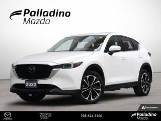 <b>BRAND NEW FRONT AND REAR BRAKE PADS AND ROTORS <br><br>Low Mileage, Heads Up Display,  Cooled Seats,  Leather Seats,  Sunroof,  Navigation!<br> <br></b><br>     In a competitive compact crossover segment, this 2022 Mazda CX-5 shines with its agile handling, beautiful and comfortable interior and impressive styling. This  2022 Mazda CX-5 is fresh on our lot in Sudbury. <br> <br>The 2022 CX-5 strengthens the connection between vehicle and driver. Mazda designers and engineers carefully consider every element of the vehicles makeup to ensure that the CX-5 outperforms expectations and elevates the experience of driving. Powerful and precise, yet comfortable and connected, the 2022 CX-5 is purposefully designed for drivers, no matter what the conditions might be. This low mileage  SUV has just 29,813 kms. Its  snowflakewhitep in colour  . It has an automatic transmission and is powered by a  187HP 2.5L 4 Cylinder Engine. <br> <br> Our CX-5s trim level is GT. This performance driven GT offers more than a beefed up drivetrain. A sunroof above heated and cooled leather seats offers incredible luxury, while the heads up display shows you ultra modern technology. Listen to your favorite tunes through your navigation equipped infotainment system complete with Bose Premium Audio, Android Auto, Apple CarPlay, and many more connectivity features. A power liftgate offers convenience and lane keep assist, blind spot monitoring, and distance pacing cruise with stop and go helps you stay safe. <br> This vehicle has been upgraded with the following features: Heads Up Display,  Cooled Seats,  Leather Seats,  Sunroof,  Navigation,  Premium Audio,  Power Liftgate. <br> <br>To apply right now for financing use this link : <a href=https://www.palladinomazda.ca/finance/ target=_blank>https://www.palladinomazda.ca/finance/</a><br><br> <br/><br>Palladino Mazda in Sudbury Ontario is your ultimate resource for new Mazda vehicles and used Mazda vehicles. We not only offer our clients a large selection of top quality, affordable Mazda models, but we do so with uncompromising customer service and professionalism. We takes pride in representing one of Canadas premier automotive brands. Mazda models lead the way in terms of affordability, reliability, performance, and fuel efficiency.The advertised price is for financing purchases only. All cash purchases will be subject to an additional surcharge of $2,501.00. This advertised price also does not include taxes and licensing fees.<br> Come by and check out our fleet of 90+ used cars and trucks and 90+ new cars and trucks for sale in Sudbury.  o~o