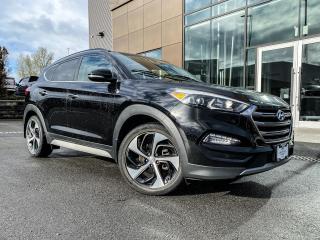 HEATED STEERING, APPLE CARPLAY, SUNROOF 
<p>
Experience the Ultimate Comfort and Style: 2018 Hyundai Tucson Limited. 
<p>
Introducing the epitome of luxury and performance, the 2018 Hyundai Tucson Limited. Engineered for the modern adventurer, this compact SUV seamlessly blends sophistication with versatility. With its sleek design and advanced features, every journey becomes an unforgettable experience. 
<p>
Key Features: 
<P>
Premium Leather Seating: Sink into luxury with the plush, leather-appointed seats that provide ultimate comfort and support for every drive. 
<P>
Cutting-Edge Technology: Stay connected and entertained with the latest in-car technology, including a responsive touchscreen display, Apple CarPlay, Android Auto, and an intuitive navigation system. 
<P>
Advanced Safety Systems: Drive with confidence knowing that the 2018 Tucson Limited is equipped with advanced safety features such as Blind-Spot Collision Warning, Lane Keeping Assist, and Automatic Emergency Braking. 
<P>
Panoramic Sunroof: Let the sun in and enjoy breathtaking views with the panoramic sunroof that extends across the entire roof of the vehicle. 
<P>
Dynamic Performance: Power meets efficiency with the responsive engine options and smooth-shifting transmission, ensuring a thrilling driving experience every time. 
<P>
Whether youre navigating city streets or exploring the great outdoors, the 2018 Hyundai Tucson Limited is your perfect companion. 
<P>
All Abbotsford Hyundai pre-owned vehicles come complete with remaining Manufacturers Warranty plus a vehicle safety report and a CarFax history report. Abbotsford Hyundai is a BBB accredited pre-owned car dealership, serving the Fraser Valley and our friends in Surrey, Langley and surrounding Lower Mainland areas. We are your Friendly Fraser Valley car dealer. We are located at 30250 Automall Drive in Abbotsford. Call or email us to schedule a test drive. 
<P>
*All Sales are subject to Taxes, $699 Doc fee and $87 Fuel Surcharge.