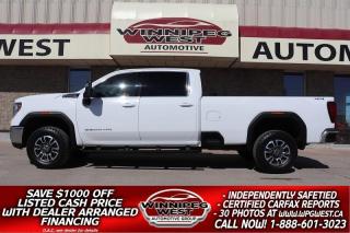 **Cash Price: $54,800. Finance Price: $53,800. (SAVE $1,000 OFF THE LISTED CASH PRICE WITH DEALER ARRANGED FINANCING O.A.C.) Plus PST/GST. NO ADMINISTRATION FEES!! 

STILL AS NEW, VERY WELL EQUIPPED AND EXTRA SHARP 2021 GMC SIERRA 3500HD SLE PREMIUM EDITION 6.6L 4X4  8FT LONG BOX WITH THE DRIVER ALERT PKG!! VERY WELL EQUIPPED & BEAUTIFUL CLEAN TRUCK WITH A CLEAN WELL SERVICED HISTORY!!

EXCEPTIONALLY CLEAN & VERY SHARP, LOW KMS WELL EQUIPPED AND WITH THE HARD-TO-FIND 8T LONG BOX! WORK READY, ALL NEW DESIGN INSIDE AND OUT 2021 GMC SIERRA 3500HD SLE PREMIUM EQUIPPED WITH THE PROVEN NEW GEN 6.6L ENGINE,  THE DRIVER ALERT PKG, HD GVW, LOADED WITH OPTIONS, CLEAN, VERY WELL SERVICED, AND READY TO GO!

- New Gen 6.6L DIRECT-INJECTION V8 (making 401 horsepower and 464 lb-ft TQ)
- Auto 3 stage 4X4 with AWD
- 6-speed automatic
- Auto Locking Rear  Diff - 3.71 ratio
- STABILITRAK W/ TRAILER SWAY  CONTROL & HILL START ASSIST
- Traction Control
- Stability Control
- Power 6-passenger Premium buckets with full size folding center console  
- Heated front Seats 
- Heated Steering wheel
- Dual Auto Climate zone controls
- Rear heat vents
- Full drivers information center
- Large 8" MyLink Multimedia Premium audio system with USB, AUX and Satellite 
- Factory Bluetooth for phone and media 
- Android and Apple Carplay 
- 4G LTE Wi-Fi Hotspot 
- Big Back up camera 
- Remote entry 
- Remote starter
- Factory power converter 
- HD Tow package 
- Factory Brake Controller 
- Factory Big tow mirrors 
- Easy step rear bumpers 
- Chrome Appearance package 
- Factory HD Black side box steps 
- OEM Fender moldings 
- GMC LED SIDE MARKER LIGHTS
- LED DAYTIME RUNNING LAMPS
- LED REFLECTOR HEADLAMPS
- LED headlamps , Fog lights and box lights
- Fog Lights / Tow hooks
- HD Silverado Chrome HD Cab Length side steps
- 120 V AC (400W) POWER OUTLET ON INSTRUMENT PANEL
- 120 V AC BED-MOUNTED POWER OUTLET
- Power Deployable rear gate on remote and dash 
- DRIVER ALERT PACKAGE 
- FRONT AND REAR PARK ASSIST
- LANE CHANGE ALERT WITH SIDE
- BLIND ZONE ALERT
- REAR CROSS-TRAFFIC ALERT
- Easy step rear bumpers
- OEM Sport alloy aluminum wheels riding on Brand New Hill Tracker A/T Tires
- Read below for more info... 

STILL SHOWS AS NEW INSIDE AND OUT AND IS EQUIPPED WITH ALL THE RIGHT OPTIONS INCLUDING THE HARD TO FIND 8FT LONG BOX, MAKING FOR A GREAT PLEASURE OR WORK TRUCK WITH HEAVY DUTY GVW! ALL NEW DESIGN, INSIDE AND OUT,  LOW KMS AND VERY CLEAN INSIDE AND OUT,  2021 GMC SIERRA 3500HD SLE PREMIUM RDITION 6.6L 4X4  8FT LONG BOX, EQUIPPED WITH THE PROVEN New Gen 6.6L DIRECT-INJECTION V8 (making 401 horsepower and 464 lb-ft TQ) & 6 SP AUTOMATIC, auto 4X4 with 3-speed transfer case incl Auto AWD, traction control.  This is a Gorgeous all new redesigned truck that has a ton of options and amazing looks for all your work or pleasure needs, that you must see and drive!!

Comes with a Fresh Manitoba Safety Certification, a Clean certified Western Canadian CARFAX history report, the balance of the Factory GM Canada warranty, PLUS we have many unlimited KM warranty options available to choose from. Selling at a fraction of new MRSP!  ON SALE NOW (HUGE VALUE!!!) Zero down financing OAC. Please see dealer for details. Trades accepted. View at Winnipeg West Automotive Group, 5195 Portage Ave. Dealer permit # 4365, Call now 1 (888) 601-3023