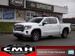 <b>CREW CAB !! V8 4X4 !! REAR CAMERA, APPLE CARPLAY, ANDROID AUTO, STEERING WHEEL AUDIO CONTROLS, POWER DRIVER SEAT, HEATED SEATS, HEATED STEERING WHEEL, DUAL CLIMATE CONTROL, REMOTE START, TOWING CONTROLLER, SPRAY LINER, HARD TONNEAU, 18-INCH ALLOY WHEELS</b><br>      This  2021 GMC Sierra 1500 is for sale today. <br> <br>This GMC Sierra 1500 stands out against all other pickup trucks, with sharper, more powerful proportions that creates a commanding stance on and off the road. Next level comfort and technology is paired with its outstanding performance and capability. Inside, the Sierra 1500 supports you through rough terrain with expertly designed seats and a pro grade suspension. Youll find an athletic and purposeful interior, designed for your active lifestyle. Get ready to live like a pro in this amazing GMC Sierra 1500! This  Crew Cab 4X4 pickup  has 183,180 kms. Its  white in colour  . It has an automatic transmission and is powered by a  355HP 5.3L 8 Cylinder Engine. <br> <br> Our Sierra 1500s trim level is SLE. Stepping up to this Sierra 1500 SLE is a great choice as it comes with enhanced features such as remote keyless entry, power windows and power door locks, a larger 8 inch touchscreen display with Apple CarPlay and Android Auto and bluetooth streaming audio and is 4G LTE capable. Additionally, this pickup truck also comes with a leather wrapped steering wheel, power-adjustable heated side mirrors, a locking tailgate, a rear vision camera, StabiliTrak, signature LED lighting, cruise control, air conditioning and a CornerStep rear bumper for added convenience.<br> <br>To apply right now for financing use this link : <a href=https://www.cmhniagara.com/financing/ target=_blank>https://www.cmhniagara.com/financing/</a><br><br> <br/><br>Trade-ins are welcome! Financing available OAC ! Price INCLUDES a valid safety certificate! Price INCLUDES a 60-day limited warranty on all vehicles except classic or vintage cars. CMH is a Full Disclosure dealer with no hidden fees. We are a family-owned and operated business for over 30 years! o~o