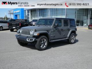 <b>Dana Axles,  Fog Lamps,  Apple CarPlay,  Android Auto!</b><br> <br>     This  2020 Jeep Wrangler Unlimited is fresh on our lot in Kanata. <br> <br>No matter where your next adventure takes you, this Jeep Wrangler Unlimited is ready for the challenge. With advanced traction and handling capability, sophisticated safety features and ample ground clearance, the Wrangler is designed to climb up and crawl over the toughest terrain. Inside the cabin of this Wrangler Unlimited offers supportive seats and comes loaded with the technology you expect while staying loyal to the style and design youve come to know and love.This  SUV has 99,256 kms. Its  gray in colour  . It has an automatic transmission and is powered by a  270HP 2.0L 4 Cylinder Engine. <br> <br> Our Wrangler Unlimiteds trim level is Sahara. This Unlimited Sahara Wrangler has a lot more goodies over the lower Sport model. To make sure you and your passengers stay connected and entertained, you will get Uconnect 4 with a 7 inch touchscreen, Apple CarPlay, Android Auto, SiriusXM, Bluetooth streaming audio and 4 USBs, 8 speakers, plus ambient interior LED lighting. Skid plates, two front tow hooks and one rear, Dana axles, shift on the fly 4x4 system, heavy duty suspension, fog lights, automatic headlamps, aluminum wheels, and tubular side steps help you rule the trail, while a rear view camera, illuminated cup holders, steering wheel with audio and cruise control, remote keyless entry, power windows, 115 volt power outlet, automatic climate control, and heated power side mirrors help you stay comfortable on the road. This vehicle has been upgraded with the following features: Dana Axles,  Fog Lamps,  Apple Carplay,  Android Auto. <br> To view the original window sticker for this vehicle view this <a href=http://www.chrysler.com/hostd/windowsticker/getWindowStickerPdf.do?vin=1C4HJXENXLW175256 target=_blank>http://www.chrysler.com/hostd/windowsticker/getWindowStickerPdf.do?vin=1C4HJXENXLW175256</a>. <br/><br> <br>To apply right now for financing use this link : <a href=https://www.myerskanatagm.ca/finance/ target=_blank>https://www.myerskanatagm.ca/finance/</a><br><br> <br/><br>Price is plus HST and licence only.<br>Book a test drive today at myerskanatagm.ca<br>*LIFETIME ENGINE TRANSMISSION WARRANTY NOT AVAILABLE ON VEHICLES WITH KMS EXCEEDING 140,000KM, VEHICLES 8 YEARS & OLDER, OR HIGHLINE BRAND VEHICLE(eg. BMW, INFINITI. CADILLAC, LEXUS...)<br> Come by and check out our fleet of 30+ used cars and trucks and 110+ new cars and trucks for sale in Kanata.  o~o