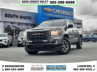 Recent Arrival! Gray 2021 GMC Canyon AT4 w/Cloth 4WD 8-Speed Automatic V6 Clean Car Fax, 4WD, 6 Speakers, ABS brakes, Air Conditioning, Alloy wheels, AM/FM radio: SiriusXM, Automatic temperature control, Cloth Seat Trim, Delay-off headlights, Driver door bin, Electronic Stability Control, Exterior Parking Camera Rear, Front anti-roll bar, Front fog lights, Fully automatic headlights, Heated door mirrors, Heated Driver & Front Passenger Seats, Heated front seats, Outside temperature display, Power door mirrors, Power driver seat, Power steering, Power windows, Radio data system, Rear step bumper, Rear window defroster, Security system, Speed control, Speed-sensing steering, Tachometer, Tilt steering wheel, Traction control, Trailering Package, Trip computer.