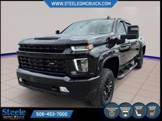 New Price!Black 2022 Chevrolet Silverado 2500HD LTZ | FOR SALE AT STEELE GMC FREDERICTON | 4WD 10-Speed Automatic Duramax 6.6L V8 Turbodiesel* Market Value Pricing *, 10-Speed Automatic, 4WD, Jet Black Leather, 10-Way Power Driver Seat Adjuster w/Lumbar, 10-Way Power Passenger Seat Adjuster w/Lumbar, 120-Volt Bed Mounted Power Outlet, 120-Volt Instrument Panel Power Outlet, 12-Volt Rear Auxiliary Power Outlet, 170 Amp Alternator, 2-Speed Active Electronic AutoTrac Transfer Case, 4.2 Diagonal Colour Display Driver Info Centre, 4-Wheel Disc Brakes, 6 Speakers, 6-Speaker Audio System, 720 Cold-Cranking Amps Heavy-Duty Battery, ABS brakes, Advanced Trailering System, Air Conditioning, Alloy wheels, AM/FM radio: SiriusXM, Apple CarPlay/Android Auto, Auto-dimming door mirrors, Auto-Dimming Inside Rear-View Mirror, Auto-dimming Rear-View mirror, Automatic temperature control, Bed View Camera w/2 Trailer Camera Provisions, Black Beltline Mouldings, Black Chevytec Spray-On Bedliner w/Chevrolet Logo, Bluetooth® For Phone, Body-Colour Door Handles, Body-Colour Front Bumper, Body-Colour Mirror Caps, Body-Colour Rear Bumper, Brake assist, Bumpers: chrome, Chevrolet Connected Access Capable, Chrome Front Grille, Chrome Mirror Caps, Colour-Keyed Carpeting Floor Covering, Compass, Deep-Tinted Glass, Delay-off headlights, Driver door bin, Driver Memory, Driver vanity mirror, Dual Charge-Only USB Ports (2nd Row), Dual front impact airbags, Dual front side impact airbags, Electric Rear-Window Defogger, Electrical Lock Control Steering Column, Electronic Cruise Control w/Set & Resume Speed, Electronic Stability Control, Exterior Parking Camera Rear, EZ Lift Power Lock & Release Tailgate, Front 40/20/40 Split-Bench Seats w/Lockable Storage, Front anti-roll bar, Front dual zone A/C, Front fog lights, Front LED Fog Lamps, Front reading lights, Front Rubberized Vinyl Floor Mats, Front wheel independent suspension, Fully automatic headlights, Gloss Black Front Bumper, Gloss Black Rear Bumper, Gooseneck/5th Wheel Package, HD Rear Vision Camera, Heated & Auto-Dim Pwr Vertical Trailering Mirrors, Heated door mirrors, Heated Driver & Front Outboard Passenger Seating, Heated front seats, Heated Steering Wheel, Heated steering wheel, High Gloss Black Door Handles, High Gloss Black Mirror Caps, High Idle Switch, Hill Descent Control, Hitch Guidance w/Hitch View, Illuminated entry, Integrated Trailer Brake Controller, Keyless Open & Start, Lane Change Alert w/Side Blind Zone Alert, Leather-Wrapped Steering Wheel, Low tire pressure warning, LTZ Plus Package, Manual Tilt & Telescoping Steering Column, Memory seat, Midnight Edition, Not Equipped w/Dr & Fr Pass Heated or Ventilated Seats, Not Equipped w/Heated 2nd Row Outboard Seats, Not Equipped w/Heated Steering Wheel (DISC), Occupant sensing airbag, Off-Road Suspension, OnStar & Chevrolet Connected Services Capable, Outside temperature display, Overhead airbag, Overhead console, Panic alarm, Passenger door bin, Passenger vanity mirror, Perf Leather-Appointed Front Outboard Seat Trim, Power Door Locks, Power driver seat, Power Front Windows w/Driver Express Up/Down, Power Front Windows w/Passenger Express Up/Down, Power passenger seat, Power Rear Windows w/Express Down, Power steering, Power Sunroof, Power windows, Premium audio system: Chevrolet Infotainment 3 Plus, Radio: Chevrolet Infotainment 3 Plus System, Rear Cross Traffic Alert, Rear reading lights, Rear Rubberized Vinyl Floor Mats, Rear window defroster, Remote keyless entry, Remote Vehicle Starter System, Safety Package, Security system, SiriusXM w/360L, Snow Plow Prep/Camper Package, Speed control, Speed-sensing steering, Split folding rear seat, Steering Wheel Audio Controls, Steering wheel mounted audio controls, Suspension Package, Tachometer, Telescoping steering wheel, Tilt steering wheel, Traction control, Trip computer, Ultrasonic Front & Rear Park Assist, Unauthorized Entry Theft-Deterrent System, Up-Level Rear Seat w/St