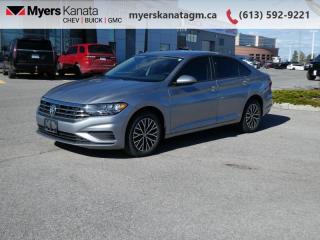 <b>Heated Seats,  LED Headlights,  Android Auto,  Apple CarPlay,  Touchscreen!</b><br> <br>     This  2021 Volkswagen Jetta is fresh on our lot in Kanata. <br> <br>Redesigned. Not over designed. Rather than adding needless flash, the Jetta has been redesigned for a tasteful, more premium look and feel. One quick glance is all it takes to appreciate the result. Its sporty. Its sleek. It makes a statement without screaming. The overall effect stands out anywhere. Its roomy and well finished interior provides the best of comforts and will help keep this elegant sedan ageless and beautiful for many years to come.This  sedan has 57,224 kms. Its  gray in colour  . It has an automatic transmission and is powered by a  147HP 1.4L 4 Cylinder Engine. <br> <br> Our Jettas trim level is Comfortline. This Jetta Comfortline features awesome aluminum wheels, fully automatic LED headlamps, heated front seats, a 6.5 inch touchscreen infotainment system with Android Auto and Apple CarPlay, air conditioning, cruise control, remote keyless entry, a rear view camera and much more. This vehicle has been upgraded with the following features: Heated Seats,  Led Headlights,  Android Auto,  Apple Carplay,  Touchscreen,  Aluminum Wheels,  App Connect. <br> <br>To apply right now for financing use this link : <a href=https://www.myerskanatagm.ca/finance/ target=_blank>https://www.myerskanatagm.ca/finance/</a><br><br> <br/><br>Price is plus HST and licence only.<br>Book a test drive today at myerskanatagm.ca<br>*LIFETIME ENGINE TRANSMISSION WARRANTY NOT AVAILABLE ON VEHICLES WITH KMS EXCEEDING 140,000KM, VEHICLES 8 YEARS & OLDER, OR HIGHLINE BRAND VEHICLE(eg. BMW, INFINITI. CADILLAC, LEXUS...)<br> Come by and check out our fleet of 30+ used cars and trucks and 110+ new cars and trucks for sale in Kanata.  o~o