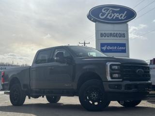 <b>Leather Seats, Lariat Ultimate Package, Premium Audio, Diesel Engine, Reverse Sensing System!</b><br> <br> <br> <br>  This Ford Super Duty is the toughest, most capable pickup truck that Ford has ever built, and thats saying a lot. <br> <br>The most capable truck for work or play, this heavy-duty Ford F-350 never stops moving forward and gives you the power you need, the features you want, and the style you crave! With high-strength, military-grade aluminum construction, this F-350 Super Duty cuts the weight without sacrificing toughness. The interior design is first class, with simple to read text, easy to push buttons and plenty of outward visibility. This truck is strong, extremely comfortable and ready for anything. <br> <br> This carbonized grey metallic sought after diesel Crew Cab 4X4 pickup   has a 10 speed automatic transmission and is powered by a  475HP 6.7L 8 Cylinder Engine.<br> <br> Our F-350 Super Dutys trim level is Lariat. Experience rugged capability and luxury in this F-350 Lariat trim, which features leather-trimmed heated and ventilated front seats with power adjustment, memory function and lumbar support, a heated leather-wrapped steering wheel, voice-activated dual-zone automatic climate control, power-adjustable pedals, a sonorous 8-speaker Bang & Olufsen audio system, and two 120-volt AC power outlets. This truck is also ready to get busy, with equipment such as class V towing equipment with a hitch, trailer wiring harness, a brake controller and trailer sway control, beefy suspension with heavy duty shock absorbers, power extendable trailer style mirrors, and LED headlights with front fog lamps and automatic high beams. Connectivity is handled by a 12-inch infotainment screen powered by SYNC 4, bundled with Apple CarPlay, Android Auto, inbuilt navigation, and SiriusXM satellite radio. Safety features also include a surround camera system, pre-collision assist with automatic emergency braking and cross-traffic alert, blind spot detection, rear parking sensors, forward collision mitigation, and a cargo bed camera. This vehicle has been upgraded with the following features: Leather Seats, Lariat Ultimate Package, Premium Audio, Diesel Engine, Reverse Sensing System, 20 Inch Aluminum Wheels, Tailgate Step. <br><br> View the original window sticker for this vehicle with this url <b><a href=http://www.windowsticker.forddirect.com/windowsticker.pdf?vin=1FT8W3BT0REC98799 target=_blank>http://www.windowsticker.forddirect.com/windowsticker.pdf?vin=1FT8W3BT0REC98799</a></b>.<br> <br>To apply right now for financing use this link : <a href=https://www.bourgeoismotors.com/credit-application/ target=_blank>https://www.bourgeoismotors.com/credit-application/</a><br><br> <br/> 5.99% financing for 84 months.  Incentives expire 2024-05-31.  See dealer for details. <br> <br>Discount on vehicle represents the Cash Purchase discount applicable and is inclusive of all non-stackable and stackable cash purchase discounts from Ford of Canada and Bourgeois Motors Ford and is offered in lieu of sub-vented lease or finance rates. To get details on current discounts applicable to this and other vehicles in our inventory for Lease and Finance customer, see a member of our team. </br></br>Discover a pressure-free buying experience at Bourgeois Motors Ford in Midland, Ontario, where integrity and family values drive our 78-year legacy. As a trusted, family-owned and operated dealership, we prioritize your comfort and satisfaction above all else. Our no pressure showroom is lead by a team who is passionate about understanding your needs and preferences. Located on the shores of Georgian Bay, our dealership offers more than just vehiclesits an experience rooted in community, trust and transparency. Trust us to provide personalized service, a diverse range of quality new Ford vehicles, and a seamless journey to finding your perfect car. Join our family at Bourgeois Motors Ford and let us redefine the way you shop for your next vehicle.<br> Come by and check out our fleet of 80+ used cars and trucks and 200+ new cars and trucks for sale in Midland.  o~o