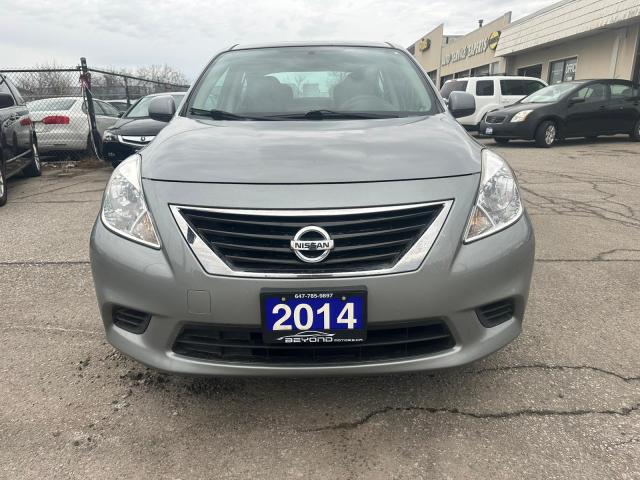 2014 Nissan Versa SV CERTIFIED WITH 3 YEARS WARRANTY INCLUDED.