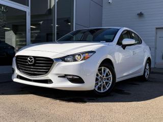 Turn heads in this phenomenal 2018 Mazda Mazda3 SE offered in incredible Snowflake White Pearl! Its powered by a2.0 Liter 4 Cylinder engine that produces 155 horsepower while paired with a smooth shifting 6-speed automatic transmission with sport mode and manual shift-mode.The exterior is complemented with halogen headlights, fog lights, and sporty alloy wheels.Open the door to our SE to find a world of comfort and convenience with black leather seating, heated front seats, a steering wheel with mounted audio/cruise controls, and Bluetooth hands-free phone capability. Space is abundant for both cargo and passengers with 60/40 split fold-down rear seats and plenty of room for 5.Our Mazda gives you peace of mind with a variety of safety features including a backup camera, dusk sensing headlights, stability/traction control, and more! Print this page and call us Now... We Know You Will Enjoy Your Test Drive Towards Ownership! We look forward to showing you why Go Mazda is the best place for all your automotive needs.Go Mazda is an AMVIC licensed business.Please note: this vehicle is showing a CarFax incident in the amount of $2,386.00