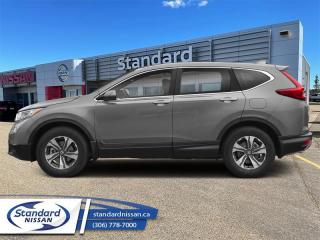 <b>Low Mileage, Heated Seats,  Automatic Braking,  Lane Keep Assist,  Rear View Camera,  Apple CarPlay!</b><br> <br>  Compare at $32588 - Our Price is just $31677! <br> <br>   Whether youre in the concrete jungle or remote mountain campsite, this 2019 Honda CR-V is ready to conquer all types of adventures with you. This  2019 Honda CR-V is for sale today in Swift Current. <br> <br>This stylish 2019 Honda CR-V has a spacious interior and car-like handling that captivates anyone who gets behind the wheel. With its smooth lines and sleek exterior, this gorgeous CR-V has no problem turning heads at every corner. Whether youre a thrift-store enthusiast, or a backcountry trail warrior with all of the camping gear, this practical Honda CR-V has got you covered! This low mileage  SUV has just 50,777 kms. Its  lunar silver metallic in colour  . It has a cvt transmission and is powered by a  190HP 1.5L 4 Cylinder Engine.  It may have some remaining factory warranty, please check with dealer for details. <br> <br> Our CR-Vs trim level is LX AWD. Stepping up to the all wheel drive version of the LX gets you automatic high and low beams and a host of safety features such as automatic collision mitigation braking, forward collision warning, lane departure warning, road departure mitigation, and lane keep assist. Other luxury features include dual-zone automatic climate control, remote start, heated seats, LED daytime running lights, heated power mirrors, and aluminum wheels. This AWD SUV also has the 7 inch touchscreen HondaLink infotainment system with HandsFreeLink bilingual Bluetooth, Apple CarPlay, Android Auto, rear view camera, and a 4 speaker sound system. This vehicle has been upgraded with the following features: Heated Seats,  Automatic Braking,  Lane Keep Assist,  Rear View Camera,  Apple Carplay,  Android Auto,  Remote Start. <br> <br>To apply right now for financing use this link : <a href=https://www.standardnissan.ca/finance/apply-for-financing/ target=_blank>https://www.standardnissan.ca/finance/apply-for-financing/</a><br><br> <br/><br>Why buy from Standard Nissan in Swift Current, SK? Our dealership is owned & operated by a local family that has been serving the automotive needs of local clients for over 110 years! We rely on a reputation of fair deals with good service and top products. With your support, we are able to give back to the community. <br><br>Every retail vehicle new or used purchased from us receives our 5-star package:<br><ul><li>*Platinum Tire & Rim Road Hazzard Coverage</li><li>**Platinum Security Theft Prevention & Insurance</li><li>***Key Fob & Remote Replacement</li><li>****$20 Oil Change Discount For As Long As You Own Your Car</li><li>*****Nitrogen Filled Tires</li></ul><br>Buyers from all over have also discovered our customer service and deals as we deliver all over the prairies & beyond!#BetterTogether<br> Come by and check out our fleet of 40+ used cars and trucks and 40+ new cars and trucks for sale in Swift Current.  o~o