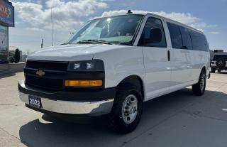 <p style=text-align: center;> </p><p style=text-align: center;><strong><span style=font-size: 18pt;>2022 CHEVROLET EXPRESS PASSENGER VAN RWD 3500 155 LS</span></strong></p><p style=text-align: center;><strong><span style=font-size: 18pt;>6.6L V8 GASOLINE ENGINE</span></strong></p><p style=text-align: center;><span style=font-size: 14pt;>401 HORSEPOWER | 464 LB-FT OF TORQUE</span></p><p style=text-align: center;><span style=font-size: 14pt;>TOWING CAPACITY: 10,000 LBS | GVWR: 9,600 LBS</span></p><p style=text-align: center;><strong><span style=font-size: 18pt;>6-SPEED AUTOMATIC TRANSMISSION</span></strong></p><p style=text-align: center;><strong><span style=font-size: 18pt;>16 STEEL WHEELS</span></strong></p><p style=text-align: center;> </p><p style=text-align: center;><strong><span style=font-size: 14pt;>CONNECTIVITY FEATURES</span></strong></p><p style=text-align: center;><span style=font-size: 14pt;> Onstar(R) Services Capable, 4G LTE Wi-Fi Hotspot Capable, AM/FM Stereo w/ MP3 Playback  Seek/scan and Digital Clock</span></p><p style=text-align: center;><strong><span style=font-size: 18.6667px;>MECHANICAL FEATURES</span></strong></p><p style=text-align: center;><span style=font-size: 14pt;>4 Wheel Antilock Disc Brakes, 150 Amp Alternator, 600 CCA Battery, Engine Block Heater, 117 Litre Fuel Tank, Hill Start Assist </span></p><p style=text-align: center;><span style=font-size: 14pt;><strong>SAFETY / SECURITY</strong></span></p><p style=text-align: center;><span style=font-size: 14pt;> Driver & Front Pass Airbags  w/ Passenger Sensing System, Head Curtain Side Airbags (1st 3 Rows), Stabilitrak(R) - Electronic Stability Control System, Automatic Front Headlamp & Rear Tail Lamp Control, Energy-absorbing Steering Column, Side Guard Door Beams, Child Seat Top Tether Anchors, Full Length Ladder-type Frame</span></p><p style=text-align: center;><strong><span style=font-size: 18.6667px;>EXTERIOR FEATURES</span></strong></p><p style=text-align: center;><span style=font-size: 14pt;> Solar Ray Deep Tinted Glass, Swing Out Windows for Rear Cargo Door and Side Door, Full Body Window Package, Variable Intermittent Wipers, 16 Steel Wheels LT245/75R-16 BW Tires (5), Composite Halogen Headlamps, Mirrors, Outside Heated Power-adjustable, Black, Manual-folding Swing Out Passenger Side 60/40 Split Cargo Doors, Engine Compartment Light</span></p><p style=text-align: center;><strong><span style=font-size: 18.6667px;>INTERIOR FEATURES</span></strong></p><p style=text-align: center;><span style=font-size: 14pt;> Rear Vision Camera, Air Conditioning, Front & Rear Auxiliary Rear Heater, Power Windows and Door Locks, Interior Reading Lamps, Reclining Front Bucket Seats, Two 3-passenger Bench Seats One 4-passenger Rear Bench Seat, Divided Into 2 Sections, Vinyl Trim, Tilt Wheel & Cruise Control, Rubberized Vinyl Floor Covering, Driver Information Centre, Power Outlet 120 Volts, Tire Pressure Monitor (Does  Not Apply to Spare Tire), Oil Life Monitor, Volt Meter, Coolant Temp, and Oil Pressure Gauges, Two Auxiliary Power Outlets, Centre Console Storage Bin, Dual Visor Vanity Mirrors, Illuminated on Passenger Side</span></p><p style=text-align: center;><strong><span style=font-size: 14pt;>OPTIONAL EQUIPMENT</span></strong></p><p style=text-align: center;><em><span style=text-decoration: underline;><span style=font-size: 14pt;>6.6l V8 Gas Engine</span></span></em></p><p style=text-align: center;><em><span style=text-decoration: underline;><span style=font-size: 14pt;>15 Person Seating Arrangement Package:<br /></span></span></em><span style=font-size: 14pt;>Reclining Front Bucket Seats, Three 3-passenger Bench Seats, One 4-passenger Rear Bench  Seat, Divided Into 2 Sections </span></p><p style=text-align: center;><em><span style=text-decoration: underline;><span style=font-size: 14pt;>Locking Rear Differential</span></span></em></p><p style=text-align: center;><em><span style=text-decoration: underline;><span style=font-size: 14pt;>H.D. Trailering Equipment</span></span></em></p><p style=text-align: center;><em><span style=text-decoration: underline;><span style=font-size: 14pt;>Leather Wrapped Steering Wheel with Audio Controls</span></span></em></p><p style=text-align: center;><em><span style=text-decoration: underline;><span style=font-size: 14pt;>Chrome Front and Rear Bumpers</span></span></em></p><p style=text-align: center;><em><span style=text-decoration: underline;><span style=font-size: 14pt;>Heavy Duty 770 CCA Battery </span></span></em></p><p style=text-align: center;><em><span style=text-decoration: underline;><span style=font-size: 14pt;>Bluetooth(R) for Phone</span></span></em></p><p style=text-align: center;> </p><p style=text-align: center;> </p><p style=text-align: center;> </p><p style=box-sizing: border-box; margin-bottom: 1rem; margin-top: 0px; color: #212529; font-family: -apple-system, BlinkMacSystemFont, Segoe UI, Roboto, Helvetica Neue, Arial, Noto Sans, Liberation Sans, sans-serif, Apple Color Emoji, Segoe UI Emoji, Segoe UI Symbol, Noto Color Emoji; font-size: 16px; background-color: #ffffff; text-align: center; line-height: 1;><span style=box-sizing: border-box; font-family: arial, helvetica, sans-serif;><span style=box-sizing: border-box; font-weight: bolder;><span style=box-sizing: border-box; font-size: 14pt;>Here at Lanoue/Amfar Sales, Service & Leasing in Tilbury, we take pride in providing the public with a wide variety of High-Quality Pre-owned Vehicles. We recondition and certify our vehicles to a level of excellence that exceeds the Status Quo. We treat our Customers like family and provide the highest level of service from Start to Finish. If you’d like a smooth & stress-free car shopping experience, give one of our Sales Associates a call at 1-844-682-3325 to help you find your next NEW-TO-YOU vehicle!</span></span></span></p><p style=box-sizing: border-box; margin-bottom: 1rem; margin-top: 0px; color: #212529; font-family: -apple-system, BlinkMacSystemFont, Segoe UI, Roboto, Helvetica Neue, Arial, Noto Sans, Liberation Sans, sans-serif, Apple Color Emoji, Segoe UI Emoji, Segoe UI Symbol, Noto Color Emoji; font-size: 16px; background-color: #ffffff; text-align: center; line-height: 1;><span style=box-sizing: border-box; font-family: arial, helvetica, sans-serif;><span style=box-sizing: border-box; font-weight: bolder;><span style=box-sizing: border-box; font-size: 14pt;>Although we try to take great care in being accurate with the information in this listing, from time to time, errors occur. The vehicle is priced as it is physically equipped. Minor variances will not effect pricing. Please verify the vehicle is As Expected when you visit. Thank You!</span></span></span></p>
