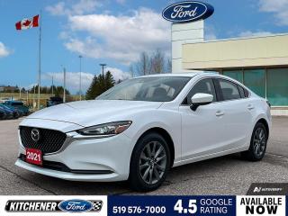 Snowflake White Pearl Mica 2021 Mazda Mazda6 GS-L 4D Sedan SKYACTIV®-G 2.5L I4 DOHC 16V 6-Speed Automatic FWD 4-Wheel Disc Brakes, 6 Speakers, ABS brakes, Air Conditioning, Alloy wheels, AM/FM radio, Anti-whiplash front head restraints, AppLink/Apple CarPlay and Android Auto, Auto High-beam Headlights, Auto-dimming Rear-View mirror, Automatic temperature control, Brake assist, Bumpers: body-colour, Delay-off headlights, Driver door bin, Driver vanity mirror, Dual front impact airbags, Dual front side impact airbags, Electronic Stability Control, Emergency communication system, Exterior Parking Camera Rear, Four wheel independent suspension, Front anti-roll bar, Front Bucket Seats, Front dual zone A/C, Front reading lights, Fully automatic headlights, Heated door mirrors, Heated front seats, Heated Front Seats (3 Settings), Heated steering wheel, Illuminated entry, Leather Shift Knob, Leatherette Upholstery, Low tire pressure warning, Occupant sensing airbag, Outside temperature display, Overhead airbag, Overhead console, Package AA00, Panic alarm, Passenger door bin, Passenger vanity mirror, Power door mirrors, Power driver seat, Power moonroof, Power steering, Power windows, Radio data system, Radio: AM/FM/HD, Rain sensing wipers, Rear anti-roll bar, Rear reading lights, Rear window defroster, Remote keyless entry, Speed control, Speed-sensing steering, Split folding rear seat, Steering wheel mounted audio controls, Tachometer, Telescoping steering wheel, Tilt steering wheel, Traction control, Trip computer, Turn signal indicator mirrors, Variably intermittent wipers, Wheels: 17 Dark Grey High Lustre Alloy.