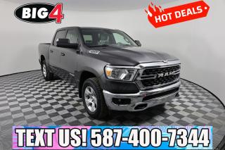 Our 2022 RAM 1500 Big Horn Crew Cab 4X4 is as functional as it is stylish in Diamond Black Crystal Pearl! Powered by a 5.7 Litre HEMI V8 offering 395hp tethered to an 8 Speed Automatic transmission to meet your towing and hauling needs. This Four Wheel Drive truck also boasts heavy-duty shocks to help you get more done with fewer hassles, and it returns approximately 10.7L/100km on the highway. Rugged good looks raise the bar even higher for our RAM 1500, making a bold impression with quad halogen headlights, fog lamps, a chrome grille, bright bumpers, and alloy wheels.

Better days come into view when youre in our Big Horn cabin. Its a smart setup thats at your service with comfortable seats, a leather-wrapped steering wheel, air conditioning, power accessories, cruise control, remote keyless entry, and pushbutton ignition. Standard Uconnect technology adds a 5-inch display screen, Bluetooth, voice recognition, and a six-speaker audio system so you can stay in touch on the go. Theres plenty of clever storage, too!

RAM safeguards your travels with a backup camera, electronic stability control, traction control, hill-start assist, tire-pressure monitoring, trailer-sway damping, advanced multistage airbags, and more. Youre ready to rock when youre driving our RAM 1500 Big Horn! Save this Page and Call for Availability. We Know You Will Enjoy Your Test Drive Towards Ownership!