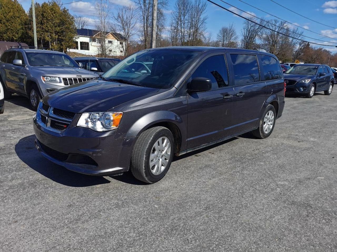 <p>BACK UP CAM-BENCH SEAT-WE FINANCE&nbsp; Looking for a reliable and spacious vehicle? Look no further than this 2019 Dodge Grand Caravan SE at Patterson Auto Sales. This pre-owned van is equipped with a powerful 3.6L V6 DOHC 24V engine, making it the perfect choice for all your family adventures. With plenty of room for passengers and cargo, this Grand Caravan is the ultimate combination of style and functionality. Don't miss out on this amazing deal, come in and test drive it today at Patterson Auto Sales!</p>