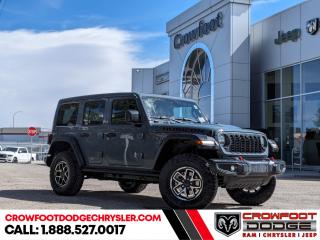 <b>Heavy Duty Suspension,  Climate Control,  Wi-Fi Hotspot,  Tow Equipment,  Fog Lamps!</b><br> <br> <br> <br><b>**Includes Jeep Wave Program - 3 Years Of Free Oil Changes - 3 Years Of Free Tire Rotations - Up To 8 Years Rental & Trip Interruption Coverage</b> <br><br>  A product of tireless innovation and timeless style, this 2024 Wrangler exhilarates with toughness, reliability, and proven capability. <br> <br>No matter where your next adventure takes you, this Jeep Wrangler is ready for the challenge. With advanced traction and handling capability, sophisticated safety features and ample ground clearance, the Wrangler is designed to climb up and crawl over the toughest terrain. Inside the cabin of this Wrangler offers supportive seats and comes loaded with the technology you expect while staying loyal to the style and design youve come to know and love.<br> <br> This black SUV  has a 8 speed automatic transmission and is powered by a  285HP 3.6L V6 Cylinder Engine.<br> <br> Our Wranglers trim level is Rubicon. Stepping up to this Wrangler Rubicon rewards you with incredible off-roading capability, thanks to heavy duty suspension, class II towing equipment that includes a hitch and trailer sway control, front active and rear anti-roll bars, upfitter switches, locking front and rear differentials, and skid plates for undercarriage protection. Interior features include an 8-speaker Alpine audio system, voice-activated dual zone climate control, front and rear cupholders, and a 12.3-inch infotainment system with smartphone integration and mobile internet hotspot access. Additional features include cruise control, a leatherette-wrapped steering wheel, proximity keyless entry, and even more. This vehicle has been upgraded with the following features: Heavy Duty Suspension,  Climate Control,  Wi-fi Hotspot,  Tow Equipment,  Fog Lamps,  Cruise Control,  Rear Camera. <br><br> <br/><br><h3><a href=https://www.crowfootdodgechrysler.com/tools/autoverify/finance.htm>Click here for instant pre-approval!</a></h3><br>

We pride ourselves in consistently exceeding our customers expectations. Please dont hesitate to give us a call.<br> Come by and check out our fleet of 80+ used cars and trucks and 130+ new cars and trucks for sale in Calgary.  o~o
