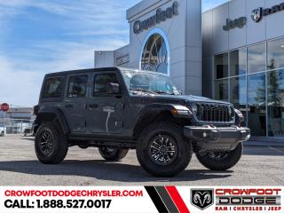 <b>Heavy Duty Suspension,  Climate Control,  Wi-Fi Hotspot,  Tow Equipment,  Fog Lamps!</b><br> <br> <br> <br><b>**Includes Jeep Wave Program - 3 Years Of Free Oil Changes - 3 Years Of Free Tire Rotations - Up To 8 Years Rental & Trip Interruption Coverage</b> <br><br>  Whether youre concurring a highway mountain pass or challenging off-road trail, this reliable Jeep Wrangler is ready to get you there with style. <br> <br>No matter where your next adventure takes you, this Jeep Wrangler is ready for the challenge. With advanced traction and handling capability, sophisticated safety features and ample ground clearance, the Wrangler is designed to climb up and crawl over the toughest terrain. Inside the cabin of this Wrangler offers supportive seats and comes loaded with the technology you expect while staying loyal to the style and design youve come to know and love.<br> <br> This black SUV  has a 8 speed automatic transmission and is powered by a  285HP 3.6L V6 Cylinder Engine.<br> <br> Our Wranglers trim level is Rubicon. Stepping up to this Wrangler Rubicon rewards you with incredible off-roading capability, thanks to heavy duty suspension, class II towing equipment that includes a hitch and trailer sway control, front active and rear anti-roll bars, upfitter switches, locking front and rear differentials, and skid plates for undercarriage protection. Interior features include an 8-speaker Alpine audio system, voice-activated dual zone climate control, front and rear cupholders, and a 12.3-inch infotainment system with smartphone integration and mobile internet hotspot access. Additional features include cruise control, a leatherette-wrapped steering wheel, proximity keyless entry, and even more. This vehicle has been upgraded with the following features: Heavy Duty Suspension,  Climate Control,  Wi-fi Hotspot,  Tow Equipment,  Fog Lamps,  Cruise Control,  Rear Camera. <br><br> <br/><br><h3><a href=https://www.crowfootdodgechrysler.com/tools/autoverify/finance.htm>Click here for instant pre-approval!</a></h3><br>

We pride ourselves in consistently exceeding our customers expectations. Please dont hesitate to give us a call.<br> Come by and check out our fleet of 70+ used cars and trucks and 140+ new cars and trucks for sale in Calgary.  o~o