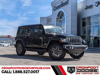 <b>Heated Seats,  Heated Steering Wheel,  Remote Start,  Navigation,  Heavy Duty Suspension!</b><br> <br> <br> <br><b>**Includes Jeep Wave Program - 3 Years Of Free Oil Changes - 3 Years Of Free Tire Rotations - Up To 8 Years Rental & Trip Interruption Coverage</b> <br><br>  With decades of experience, and all the modern technology they could need, this Jeep Wrangler is ready to rock your world. <br> <br>No matter where your next adventure takes you, this Jeep Wrangler is ready for the challenge. With advanced traction and handling capability, sophisticated safety features and ample ground clearance, the Wrangler is designed to climb up and crawl over the toughest terrain. Inside the cabin of this Wrangler offers supportive seats and comes loaded with the technology you expect while staying loyal to the style and design youve come to know and love.<br> <br> This black SUV  has a 8 speed automatic transmission and is powered by a  285HP 3.6L V6 Cylinder Engine.<br> <br> Our Wranglers trim level is Sahara. This Wrangler Sahara features incredible off-roading capability, thanks to heavy duty suspension, towing equipment that includes trailer sway control, and skid plates for undercarriage protection. Interior features include heated front seats with lumbar support, a heated steering wheel, an 8-speaker Alpine audio system, voice-activated dual zone climate control, front and rear cupholders, and a 12.3-inch infotainment system with navigation, smartphone integration and mobile internet hotspot access. Additional features include a convertible top with fixed rollover protection, cruise control, proximity keyless entry with remote start, and even more. This vehicle has been upgraded with the following features: Heated Seats,  Heated Steering Wheel,  Remote Start,  Navigation,  Heavy Duty Suspension,  Climate Control,  Wi-fi Hotspot. <br><br> <br/><br><h3><a href=https://www.crowfootdodgechrysler.com/tools/autoverify/finance.htm>Click here for instant pre-approval!</a></h3><br>

We pride ourselves in consistently exceeding our customers expectations. Please dont hesitate to give us a call.<br> Come by and check out our fleet of 80+ used cars and trucks and 130+ new cars and trucks for sale in Calgary.  o~o