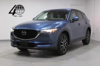 <p>The CX-5 is a compact Mazda SUV. powered by a 2.5L engine with all-wheel drive. Optioned in Eternal Blue Mica over a black leather interior on 19” alloy wheels. Features include keyless entry with push-button start, a Bose sound system with Bluetooth connectivity, integrated navigation, a backup camera, heated steering, heated front seats, a power liftgate, a backup camera, and adjustable drive modes!</p>

<p>World Fine Cars Ltd. has been in business for over 40 years and maintains over 90 pre-owned vehicles in inventory at all times. Every certified retailed vehicle will have a 3 Month 3000 KM POWERTRAIN WARRANTY WITH SEALS AND GASKETS COVERAGE, with our compliments (conditions apply please contact for details). CarFax Reports are always available at no charge. We offer a full service center and we are able to service everything we sell. With a state of the art showroom including a comfortable customer lounge with WiFi access. We invite you to contact us today 1-888-334-2707 www.worldfinecars.com</p>