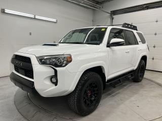 TOP OF THE LINE TRD PRO!! Roof rack, Predator side-steps, sunroof, heated leather seats, TRD-tuned Fox shocks, TRD skid plates, Heritage grille, remote start, 360 camera, navigation, blind spot monitor, rear cross-traffic alert, pre-collision system, lane-departure alert, lane-keep assist, adaptive cruise control, crawl control, 17-inch alloys, 15-speaker JBL premium audio, TRD shift knob, power seats, 8-inch touchscreen w/ Apple CarPlay/Android Auto, tow package, hood scoop, dual-zone climate control, lever-style transfer case controls, automatic headlights w/ auto highbeams, LED fog lights, drive/terrain mode selector, Bluetooth and Sirius XM!