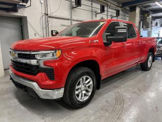 STUNNING RED HOT LT 4x4 CREW CAB W/ OVER $7,000 IN FACTORY OPTIONS INCL. 5.3L V8 AND Z71 OFF ROAD PACKAGE! Heated seats & steering, remote start, massive 13.4-inch touchscreen w/ Apple CarPlay/Android Auto, pre-collision system, lane-departure alert, HD backup camera, premium 18-inch alloys, tow package w/ integrated trailer brake controller, premium trailer tow mirrors, premium front bucket seats & console w/ wireless charger, skid plates, power seat, 6-foot 7-inch box w/ spray-in bedliner, dual-zone climate control, automatic headlights w/ auto highbeams, keyless entry w/ push start, Bluetooth and Sirius XM!!!