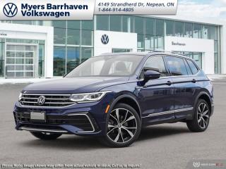 <b>Leather Seats!</b><br> <br> <br> <br>  The VW Tiguan aces real-world utility with its excellent outward vision, comfortable interior, and supreme on road capabilities. <br> <br>Whether its a weekend warrior or the daily driver this time, this 2024 Tiguan makes every experience easier to manage. Cutting edge tech, both inside the cabin and under the hood, allow for safe, comfy, and connected rides that keep the whole party going. The crossover of the future is already here, and its called the Tiguan.<br> <br> This atlantic blue SUV  has an automatic transmission and is powered by a  2.0L I4 16V GDI DOHC Turbo engine.<br> <br> Our Tiguans trim level is Highline R-Line. This range-topping Tiguan Highline R-Line is fully-loaded with ventilated and heated leather-wrapped seats with power adjustment, lumbar support and memory function, a heated leather-wrapped steering wheel, an 8-speaker Fender audio system with a subwoofer, adaptive cruise control, a 360-camera with aerial view, park distance control with automated parking sensors, and remote engine start. Additional features include an express open/close sunroof with tilt and slide functions and a power sunshade, rain detecting wipers with heated jets, a power liftgate, 4G LTE mobile hotspot internet access, and an 8-inch infotainment screen with satellite navigation, wireless Apple CarPlay and Android Auto, and SiriusXM streaming radio. Safety features also include blind spot detection, lane keep assist, lane departure warning, VW Car-Net Safe & Secure, forward and rear collision mitigation, and autonomous emergency braking. This vehicle has been upgraded with the following features: Leather Seats. <br><br> <br>To apply right now for financing use this link : <a href=https://www.barrhavenvw.ca/en/form/new/financing-request-step-1/44 target=_blank>https://www.barrhavenvw.ca/en/form/new/financing-request-step-1/44</a><br><br> <br/>    4.99% financing for 84 months. <br> Buy this vehicle now for the lowest bi-weekly payment of <b>$326.34</b> with $0 down for 84 months @ 4.99% APR O.A.C. ( Plus applicable taxes -  $840 Documentation fee. Cash purchase selling price includes: Tire Stewardship ($20.00), OMVIC Fee ($12.50). (HST) are extra. </br>(HST), licence, insurance & registration not included </br>    ).  Incentives expire 2024-05-31.  See dealer for details. <br> <br> <br>LEASING:<br><br>Estimated Lease Payment: $276 bi-weekly <br>Payment based on 3.99% lease financing for 48 months with $0 down payment on approved credit. Total obligation $28,707. Mileage allowance of 16,000 KM/year. Offer expires 2024-05-31.<br><br><br>We are your premier Volkswagen dealership in the region. If youre looking for a new Volkswagen or a car, check out Barrhaven Volkswagens new, pre-owned, and certified pre-owned Volkswagen inventories. We have the complete lineup of new Volkswagen vehicles in stock like the GTI, Golf R, Jetta, Tiguan, Atlas Cross Sport, Volkswagen ID.4 electric vehicle, and Atlas. If you cant find the Volkswagen model youre looking for in the colour that you want, feel free to contact us and well be happy to find it for you. If youre in the market for pre-owned cars, make sure you check out our inventory. If you see a car that you like, contact 844-914-4805 to schedule a test drive.<br> Come by and check out our fleet of 30+ used cars and trucks and 90+ new cars and trucks for sale in Nepean.  o~o