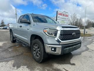 <p><span style=font-size: 14pt;><strong>2018 Toyota Tundra SR5 4x4</strong></span></p><p><span style=font-size: 14pt;>Introducing the 2018 Toyota Tundra SR5 – where power meets reliability. This truck is built to handle any task with its robust engine and rugged design. With impressive towing capability and a spacious interior, the Tundra SR5 offers both strength and comfort for any adventure. Dont miss out on the opportunity to elevate your driving experience. Schedule your test drive today and discover the unmatched quality of the 2018 Toyota Tundra SR5!</span></p><p><span style=font-size: 14pt;><strong>CARS IN LOBO LTD. (Buy - Sell - Trade - Finance) <br /></strong></span><span style=font-size: 14pt;><strong style=font-size: 18.6667px;>Office# - 519-666-2800<br /></strong></span><span style=font-size: 14pt;><strong>TEXT 24/7 - 226-289-5416</strong></span></p><p><span style=font-size: 12pt;>-> LOCATION <a title=Location  href=https://www.google.com/maps/place/Cars+In+Lobo+LTD/@42.9998602,-81.4226374,15z/data=!4m5!3m4!1s0x0:0xcf83df3ed2d67a4a!8m2!3d42.9998602!4d-81.4226374 target=_blank rel=noopener>6355 Egremont Dr N0L 1R0 - 6 KM from fanshawe park rd and hyde park rd in London ON</a><br />-> Quality pre owned local vehicles. CARFAX available for all vehicles <br />-> Certification is included in price unless stated AS IS or ask about our AS IS pricing<br />-> We offer Extended Warranty on our vehicles inquire for more Info<br /></span><span style=font-size: small;><span style=font-size: 12pt;>-> All Trade ins welcome (Vehicles,Watercraft, Motorcycles etc.)</span><br /><span style=font-size: 12pt;>-> Financing Available on qualifying vehicles <a title=FINANCING APP href=https://carsinlobo.ca/fast-loan-approvals/ target=_blank rel=noopener>APPLY NOW -> FINANCING APP</a></span><br /><span style=font-size: 12pt;>-> Register & license vehicle for you (Licensing Extra)</span><br /><span style=font-size: 12pt;>-> No hidden fees, Pressure free shopping & most competitive pricing</span></span></p><p><span style=font-size: small;><span style=font-size: 12pt;>MORE QUESTIONS? FEEL FREE TO CALL (519 666 2800)/TEXT </span></span><span style=font-size: 18.6667px;>226-289-5416</span><span style=font-size: small;><span style=font-size: 12pt;> </span></span><span style=font-size: 12pt;>/EMAIL (Sales@carsinlobo.ca)</span></p>