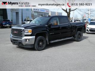 <b>Bluetooth,  Rear View Camera,  Steering Wheel Audio Control,  SiriusXM,  Cruise Control!</b><br> <br>     This  2018 GMC Sierra 2500HD is fresh on our lot in Kanata. <br> <br>Get the job done in comfort and style with this GMC Sierra 2500HD. This Sierra 2500HD can do the big jobs while displaying good road manners around town and on the open road. Experience professional grade capability and comfort in this capable GMC Sierra 2500HD. GMC trucks have a track record of capability, refinement and dependability, thats no different in this heavy duty hauler. Inside, the Sierra 2500HD supports you through rough terrain with expertly designed seats and a pro grade suspension. Youll find an athletic and purposeful interior, designed for your busy lifestyle. This  sought after diesel Crew Cab 4X4 pickup  has 77,135 kms. Its  black in colour  . It has an automatic transmission and is powered by a  445HP 6.6L 8 Cylinder Engine. <br> <br> Our Sierra 2500HDs trim level is SLE. This Sierra SLE is packed with features like aluminum wheels, an EZ-Lift and lower tailgate, 8 inch colour touchscreen with IntelliLink, SiriusXM, steering wheel audio controls, a rear vision camera, remote keyless entry, power windows plus much more to give you more comfortable and relaxing ride while out on the open road. This vehicle has been upgraded with the following features: Bluetooth,  Rear View Camera,  Steering Wheel Audio Control,  Siriusxm,  Cruise Control,  Power Windows. <br> <br>To apply right now for financing use this link : <a href=https://www.myerskanatagm.ca/finance/ target=_blank>https://www.myerskanatagm.ca/finance/</a><br><br> <br/><br>Price is plus HST and licence only.<br>Book a test drive today at myerskanatagm.ca<br>*LIFETIME ENGINE TRANSMISSION WARRANTY NOT AVAILABLE ON VEHICLES WITH KMS EXCEEDING 140,000KM, VEHICLES 8 YEARS & OLDER, OR HIGHLINE BRAND VEHICLE(eg. BMW, INFINITI. CADILLAC, LEXUS...)<br> Come by and check out our fleet of 40+ used cars and trucks and 110+ new cars and trucks for sale in Kanata.  o~o