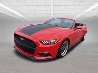 The 2016 Ford Mustang EcoBoost Premium is a sporty and stylish iteration of Fords iconic muscle car, offering a blend of performance, efficiency, and upscale features. Heres a description highlighting its key aspects:Exterior Design: The 2016 Mustang EcoBoost Premium boasts the classic Mustang silhouette with modern touches. Its sleek, aerodynamic lines are complemented by signature Mustang design cues such as the iconic tri-bar taillights and aggressive front grille. Available options may include eye-catching paint colors, distinctive alloy wheel designs, and optional performance packages for enhanced styling.Engine Performance: Under the hood, the Mustang EcoBoost Premium is powered by a turbocharged 2.3-liter four-cylinder engine, delivering exhilarating performance with 310 horsepower and 320 lb-ft of torque. This engine provides robust acceleration and responsive throttle response, making it a thrill to drive on both city streets and winding roads.Transmission: The EcoBoost Premium typically comes paired with a six-speed manual transmission as standard, offering engaging gear shifts and precise control. Alternatively, buyers may opt for the available six-speed automatic transmission with paddle shifters for effortless cruising.Interior Comfort and Technology: Stepping inside, the Mustang EcoBoost Premium welcomes occupants with a refined cabin adorned with high-quality materials and modern amenities. Features such as leather-trimmed seating, power-adjustable front seats, and dual-zone automatic climate control enhance comfort for both the driver and passengers. Cutting-edge technology abounds, including the SYNC 3 infotainment system with an intuitive touchscreen interface, smartphone integration, navigation, premium audio systems, and available driver assistance features like blind-spot monitoring and rear cross-traffic alert.Driving Dynamics: Renowned for its dynamic handling and spirited performance, the Mustang EcoBoost Premium delivers a balanced and exhilarating driving experience. Its sport-tuned suspension and precise steering contribute to agile handling, while available performance upgrades such as performance brakes and adaptive damping systems further enhance driving dynamics.Safety Features: In terms of safety, the Mustang EcoBoost Premium is equipped with a range of advanced safety features to help protect occupants on the road. Standard safety equipment may include multiple airbags, electronic stability control, traction control, and a rearview camera. Optional safety technologies like adaptive cruise control, forward collision warning, and automatic emergency braking may also be available.Overall, the 2016 Ford Mustang EcoBoost Premium combines performance, style, and technology in a compelling package, appealing to enthusiasts seeking a thrilling driving experience with everyday comfort and refinement.