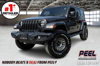 2021 Jeep Wrangler 4 Door Sahara Altitude | 3.6L V6 | Granite Crystal Metallic | 35" Tires on 17" Fuel Cycle Wheels | Leather Seats | Uconnect 4C w/ Navigation | Apple CarPlay & Android Auto | Alpine Premium Audio | Trailer Tow Group | Full-time 4WD System w/ 4WD Auto

One Owner Clean Carfax

Presenting the 2021 Jeep Wrangler 4 Door Sahara Altitude, a rugged and stylish off-road vehicle designed to conquer any terrain with ease. Finished in the sleek Granite Crystal Metallic, this Jeep stands out on the road and off it. Equipped with a potent 3.6L V6 engine, it delivers impressive power and performance for your adventures. Ride in comfort on leather seats while enjoying seamless connectivity and navigation through the Uconnect 4C system with Apple CarPlay and Android Auto integration. Immerse yourself in premium sound with the Alpine Premium Audio system as you tackle rough trails with confidence, thanks to 35" tires mounted on striking Fuel Cycle 17" Wheels. With the Trailer Tow Group and a full-time 4WD system including 4WD Auto mode, this Wrangler is ready for towing and traversing challenging terrains without breaking a sweat. Experience the ultimate blend of capability and luxury in the 2021 Jeep Wrangler Sahara Altitude.
______________________________________________________

Engage & Explore with Peel Chrysler: Whether youre inquiring about our latest offers or seeking guidance, 1-866-652-6197 connects you directly. Dive deeper online or connect with our team to navigate your automotive journey seamlessly.

WE TAKE ALL TRADES & CREDIT. WE SHIP ANYWHERE IN CANADA! OUR TEAM IS READY TO SERVE YOU 7 DAYS! COME SEE WHY NOBODY BEATS A DEAL FROM PEEL! Your Source for ALL make and models used cars and trucks
______________________________________________________

*FREE CarFax (click the link above to check it out at no cost to you!)*

*FULLY CERTIFIED! (Have you seen some of these other dealers stating in their advertisements that certification is an additional fee? NOT HERE! Our certification is already included in our low sale prices to save you more!)

______________________________________________________

Peel Chrysler  A Trusted Destination: Based in Port Credit, Ontario, we proudly serve customers from all corners of Ontario and Canada including Toronto, Oakville, North York, Richmond Hill, Ajax, Hamilton, Niagara Falls, Brampton, Thornhill, Scarborough, Vaughan, London, Windsor, Cambridge, Kitchener, Waterloo, Brantford, Sarnia, Pickering, Huntsville, Milton, Woodbridge, Maple, Aurora, Newmarket, Orangeville, Georgetown, Stouffville, Markham, North Bay, Sudbury, Barrie, Sault Ste. Marie, Parry Sound, Bracebridge, Gravenhurst, Oshawa, Ajax, Kingston, Innisfil and surrounding areas. On our website www.peelchrysler.com, you will find a vast selection of new vehicles including the new and used Ram 1500, 2500 and 3500. Chrysler Grand Caravan, Chrysler Pacifica, Jeep Cherokee, Wrangler and more. All vehicles are priced to sell. We deliver throughout Canada. website or call us 1-866-652-6197. 

Your Journey, Our Commitment: Beyond the transaction, Peel Chrysler prioritizes your satisfaction. While many of our pre-owned vehicles come equipped with two keys, variations might occur based on trade-ins. Regardless, our commitment to quality and service remains steadfast. Experience unmatched convenience with our nationwide delivery options. All advertised prices are for cash sale only. Optional Finance and Lease terms are available. A Loan Processing Fee of $499 may apply to facilitate selected Finance or Lease options. If opting to trade an encumbered vehicle towards a purchase and require Peel Chrysler to facilitate a lien payout on your behalf, a Lien Payout Fee of $299 may apply. Contact us for details. Peel Chrysler Pre-Owned Vehicles come standard with only one key.