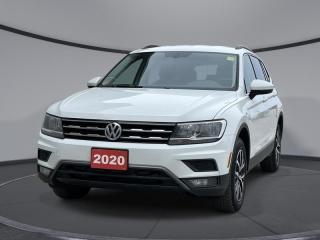 <b>Power Liftgate,  Heated Seats,  Alloy Wheels,  Apple CarPlay,  Android Auto!</b><br> <br>    The VW Tiguan aces real-world utility with its excellent outward vision, comfortable interior, and supreme on road capabilities. This  2020 Volkswagen Tiguan is fresh on our lot in Sudbury. <br> <br>The weekend warrior! As one of the most minimalist styled crossover SUVs, the Tiguan is the winner of elegance in its competition. Crisp lines, a luxurious ride quality and the largest interior within its class give this Tiguan the high marks as the leader of the crossover SUV segment.This  SUV has 87,905 kms. Its  pure white in colour  . It has an automatic transmission and is powered by a  2.0L I4 16V GDI DOHC Turbo engine.  It may have some remaining factory warranty, please check with dealer for details. <br> <br> Our Tiguans trim level is Comfortline. This compact and fully capable Volkswagen Tiguan is loaded with forward collision warning and autonomous emergency braking, unique alloy wheels, blind spot detection, heated front comfort seats, chrome exterior trim, a 6 speaker audio system with a 6.5 inch touchscreen display, App-Connect smartphone integration, Apple CarPlay, Android Auto and streaming audio, remote keyless entry, cruise control, a rear view camera and much more. This vehicle has been upgraded with the following features: Power Liftgate,  Heated Seats,  Alloy Wheels,  Apple Carplay,  Android Auto,  Streaming Audio,  Remote Keyless Entry. <br> <br>To apply right now for financing use this link : <a href=https://www.palladinohonda.com/finance/finance-application target=_blank>https://www.palladinohonda.com/finance/finance-application</a><br><br> <br/><br>Palladino Honda is your ultimate resource for all things Honda, especially for drivers in and around Sturgeon Falls, Elliot Lake, Espanola, Alban, and Little Current. Our dealership boasts a vast selection of high-class, top-quality Honda models, as well as expert financing advice and impeccable automotive service. These factors arent what set us apart from other dealerships, though. Rather, our uncompromising customer service and professionalism make every experience unforgettable, and keeps drivers coming back. The advertised price is for financing purchases only. All cash purchases will be subject to an additional surcharge of $2,501.00. This advertised price also does not include taxes and licensing fees.<br> Come by and check out our fleet of 110+ used cars and trucks and 70+ new cars and trucks for sale in Sudbury.  o~o