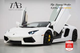 This Powerful 2012 Lamborghini Aventador LP 700-4 epitomizes the pinnacle of automotive engineering, combining breathtaking performance with iconic design comes with a clean Carfax report. With its aggressive and futuristic styling, characterized by sharp angles, aerodynamic lines, and iconic scissor doors, the Aventador commands attention wherever it goes. 

Key Features Includes: 

- LP 700-4 
- V12 
- Novitec Springs 
- Novitec Spacers 
- IPE exhaust 
- IPE down pipes 
- Valved exhaust 
- Upgraded factory wheels Ap Tech Dione 
- Navigation 
- DVD 
- Bluetooth 
- Sirius XM Radio 
- Drive Modes 
- Yellow Carbon Ceramic Brake Calipers 
- 20" Alloy Wheels

NOW OFFERING 3 MONTH DEFERRED FINANCING PAYMENTS ON APPROVED CREDIT.

 Looking for a top-rated pre-owned luxury car dealership in the GTA? Look no further than Toronto Auto Brokers (TAB)! Were proud to have won multiple awards, including the 2023 GTA Top Choice Luxury Pre Owned Dealership Award, 2023 CarGurus Top Rated Dealer, 2024 CBRB Dealer Award, the Canadian Choice Award 2024,the 2024 BNS Award, the 2023 Three Best Rated Dealer Award, and many more!

With 30 years of experience serving the Greater Toronto Area, TAB is a respected and trusted name in the pre-owned luxury car industry. Our 30,000 sq.Ft indoor showroom is home to a wide range of luxury vehicles from top brands like BMW, Mercedes-Benz, Audi, Porsche, Land Rover, Jaguar, Aston Martin, Bentley, Maserati, and more. And we dont just serve the GTA, were proud to offer our services to all cities in Canada, including Vancouver, Montreal, Calgary, Edmonton, Winnipeg, Saskatchewan, Halifax, and more.

At TAB, were committed to providing a no-pressure environment and honest work ethics. As a family-owned and operated business, we treat every customer like family and ensure that every interaction is a positive one. Come experience the TAB Lifestyle at its truest form, luxury car buying has never been more enjoyable and exciting!

We offer a variety of services to make your purchase experience as easy and stress-free as possible. From competitive and simple financing and leasing options to extended warranties, aftermarket services, and full history reports on every vehicle, we have everything you need to make an informed decision. We welcome every trade, even if youre just looking to sell your car without buying, and when it comes to financing or leasing, we offer same day approvals, with access to over 50 lenders, including all of the banks in Canada. Feel free to check out your own Equifax credit score without affecting your credit score, simply click on the Equifax tab above and see if you qualify.

So if youre looking for a luxury pre-owned car dealership in Toronto, look no further than TAB! We proudly serve the GTA, including Toronto, Etobicoke, Woodbridge, North York, York Region, Vaughan, Thornhill, Richmond Hill, Mississauga, Scarborough, Markham, Oshawa, Peteborough, Hamilton, Newmarket, Orangeville, Aurora, Brantford, Barrie, Kitchener, Niagara Falls, Oakville, Cambridge, Kitchener, Waterloo, Guelph, London, Windsor, Orillia, Pickering, Ajax, Whitby, Durham, Cobourg, Belleville, Kingston, Ottawa, Montreal, Vancouver, Winnipeg, Calgary, Edmonton, Regina, Halifax, and more.

Call us today or visit our website to learn more about our inventory and services. And remember, all prices exclude applicable taxes and licensing, and vehicles can be certified at an additional cost of $799.