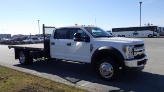 2019 Ford F-550 Crew Cab DRW 4WD Flat deck 4WD, 6.8L, 4 door, automatic, 4WD, air conditioning, AM/FM radio, white exterior, Deck Mounted Spare Tire, 4wd Selector, Manual Mode, Drive Mode Selector, Aux, Bluetooth, A/C, 6 Auxiliary Buttons, Trailer Brake Controller. Dimensions of Flatdeck Length 11 feet 10 inches Width 7 feet 10 inches. Wheelbase 203 inches. Certification and Decal Valid until February  2025. $55,610.00 plus $375 processing fee, $55,985.00 total payment obligation before taxes.  Listing report, warranty, contract commitment cancellation fee, financing available on approved credit (some limitations and exceptions may apply). All above specifications and information is considered to be accurate but is not guaranteed and no opinion or advice is given as to whether this item should be purchased. We do not allow test drives due to theft, fraud and acts of vandalism. Instead we provide the following benefits: Complimentary Warranty (with options to extend), Limited Money Back Satisfaction Guarantee on Fully Completed Contracts, Contract Commitment Cancellation, and an Open-Ended Sell-Back Option. Ask seller for details or call 604-522-REPO(7376) to confirm listing availability.